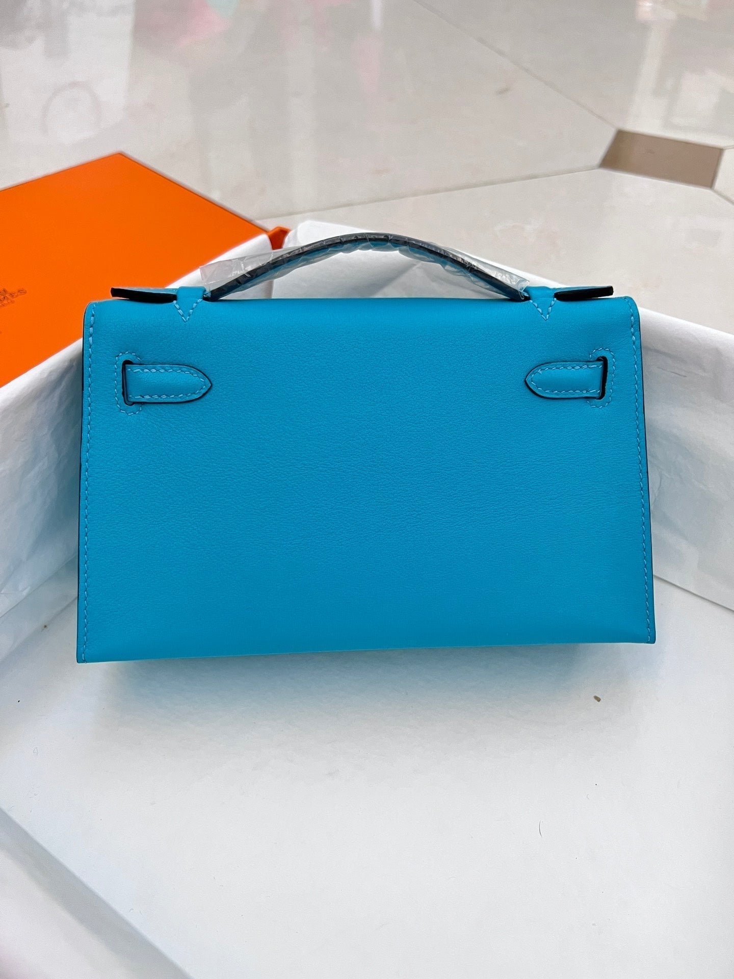 POCHETTE HM KELLY 22 CM CÉRULÉEN SWIFT QUINCAILLERIE ARGENTÉE