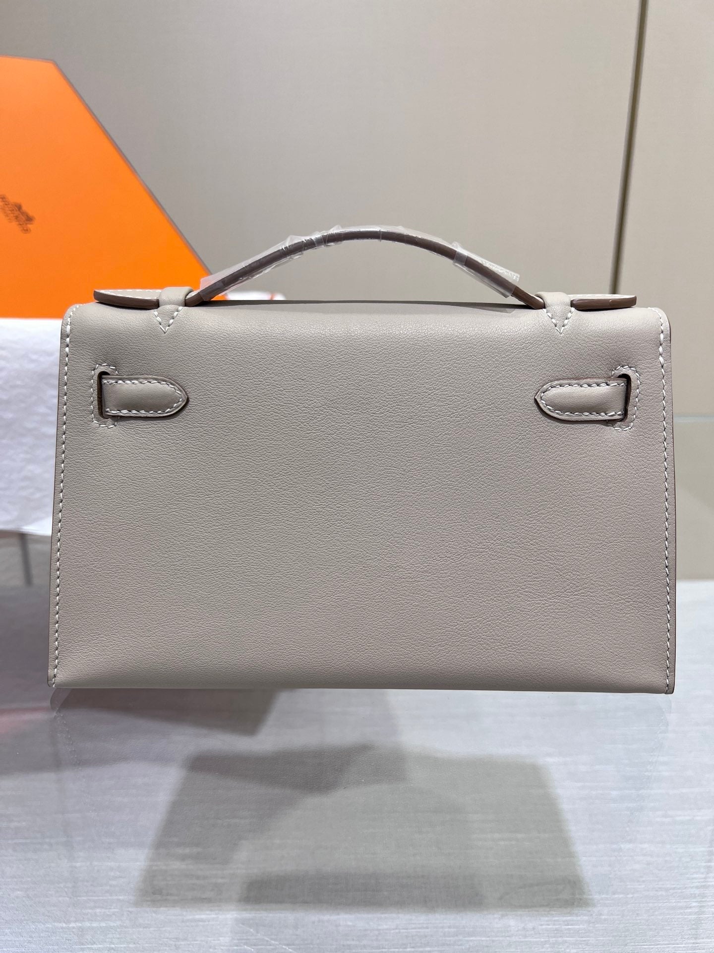 POCHETTE HM KELLY 22 CM GRIS SWIFT QUINCAILLERIE DOREE