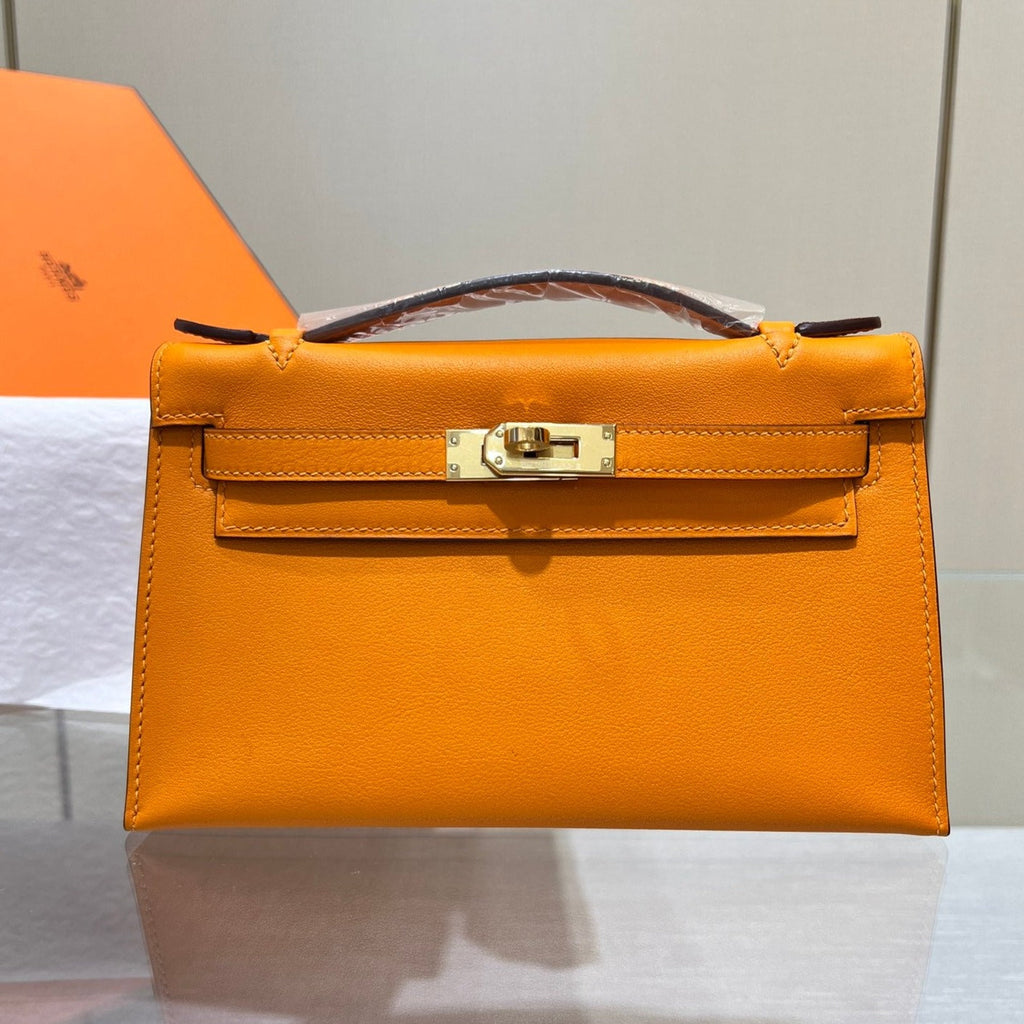 POCHETTE HM KELLY 22 CM ORANGE SWIFT QUINCAILLERIE DOREE