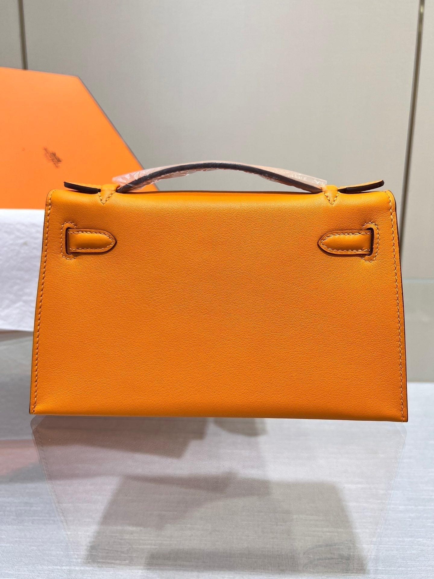 POCHETTE HM KELLY 22 CM ORANGE SWIFT QUINCAILLERIE DOREE