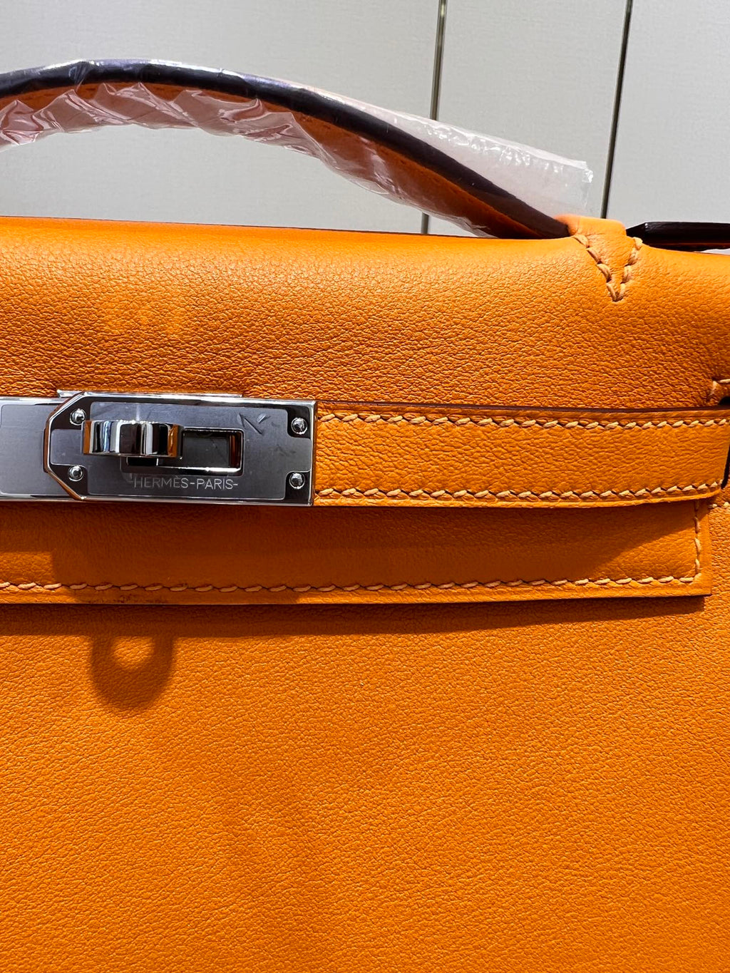 POCHETTE HM KELLY 22 CM ORANGE SWIFT QUINCAILLERIE ARGENTÉE