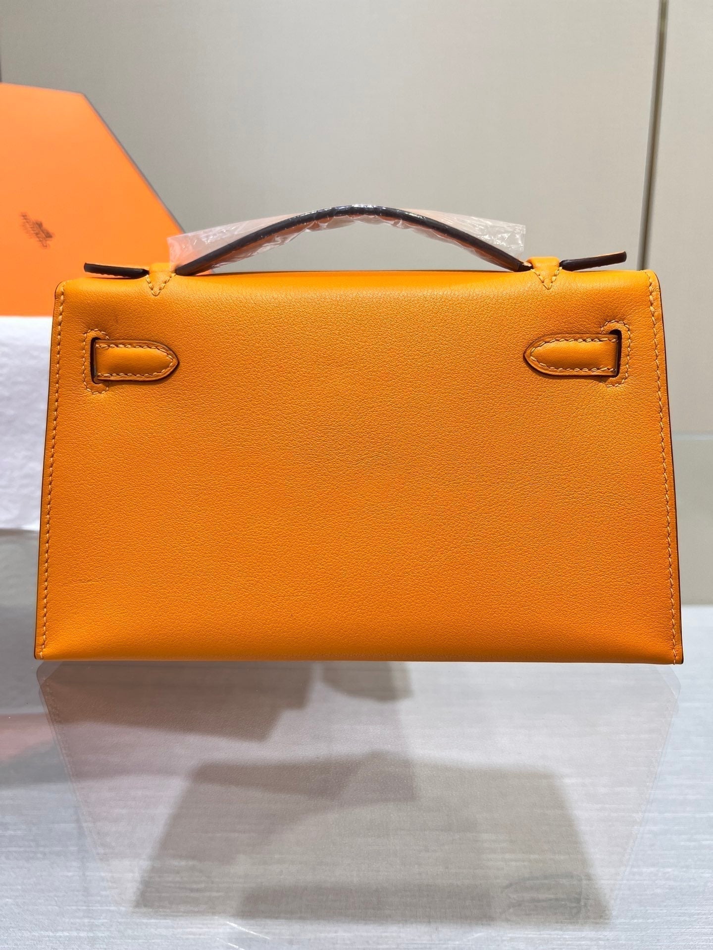 POCHETTE HM KELLY 22 CM ORANGE SWIFT QUINCAILLERIE ARGENTÉE