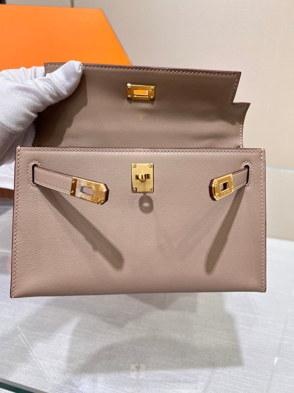 POCHETTE HM KELLY 22CM GRIS ASPHALT SWIFT GOLD HARDWARE