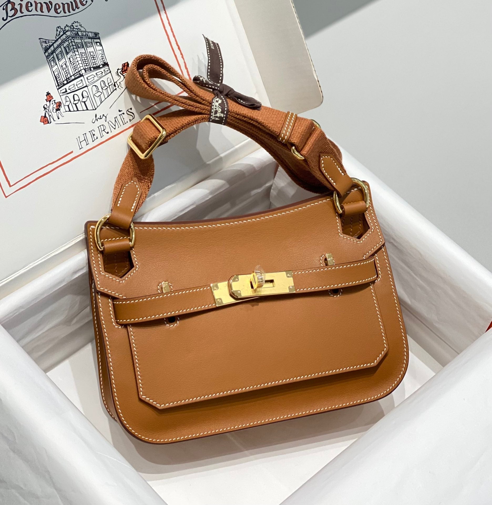 SAC BANDOULIÈRE EN CUIR TAN KELLY 23CM JYPSIERE GHW