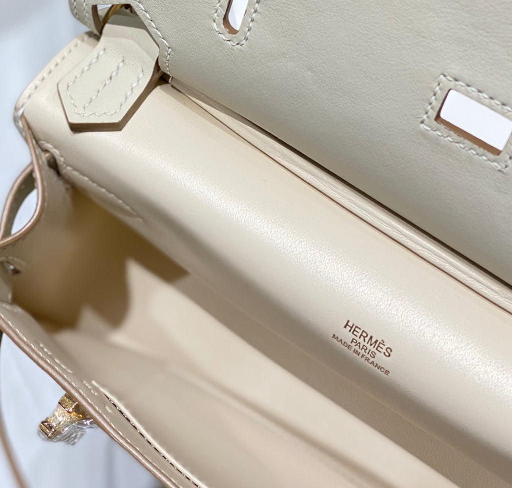SAC BANDOULIÈRE KELLY 23 CM JYPSIERE EN CUIR BLANC GHW