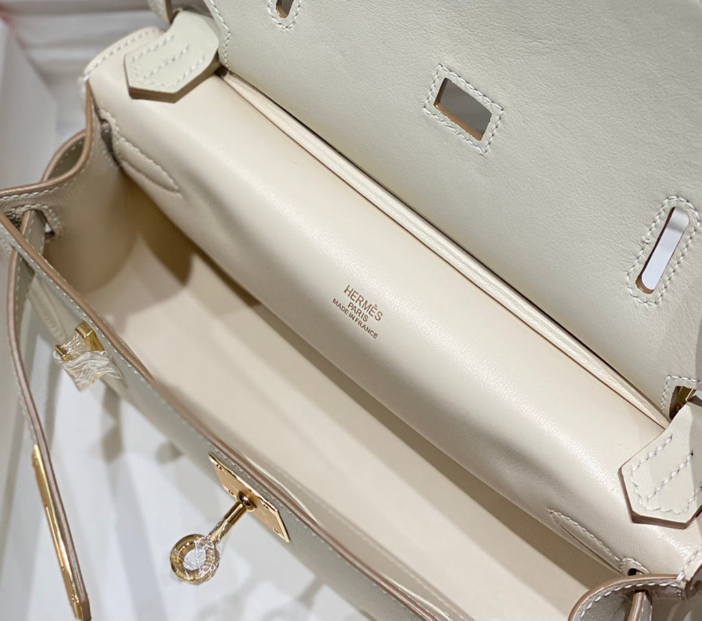 SAC BANDOULIÈRE KELLY 23 CM JYPSIERE EN CUIR BLANC GHW