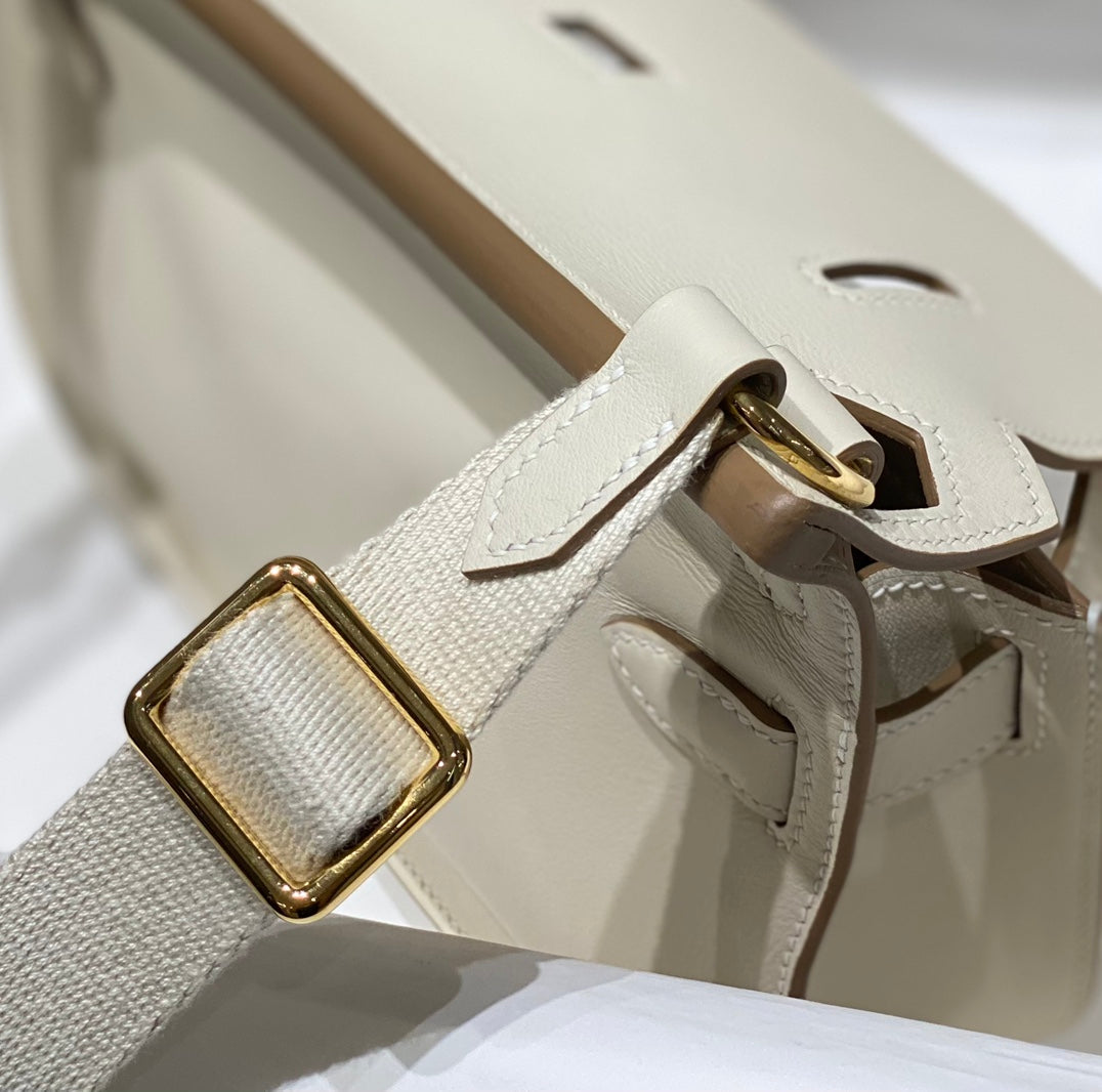 SAC BANDOULIÈRE KELLY 23 CM JYPSIERE EN CUIR BLANC GHW