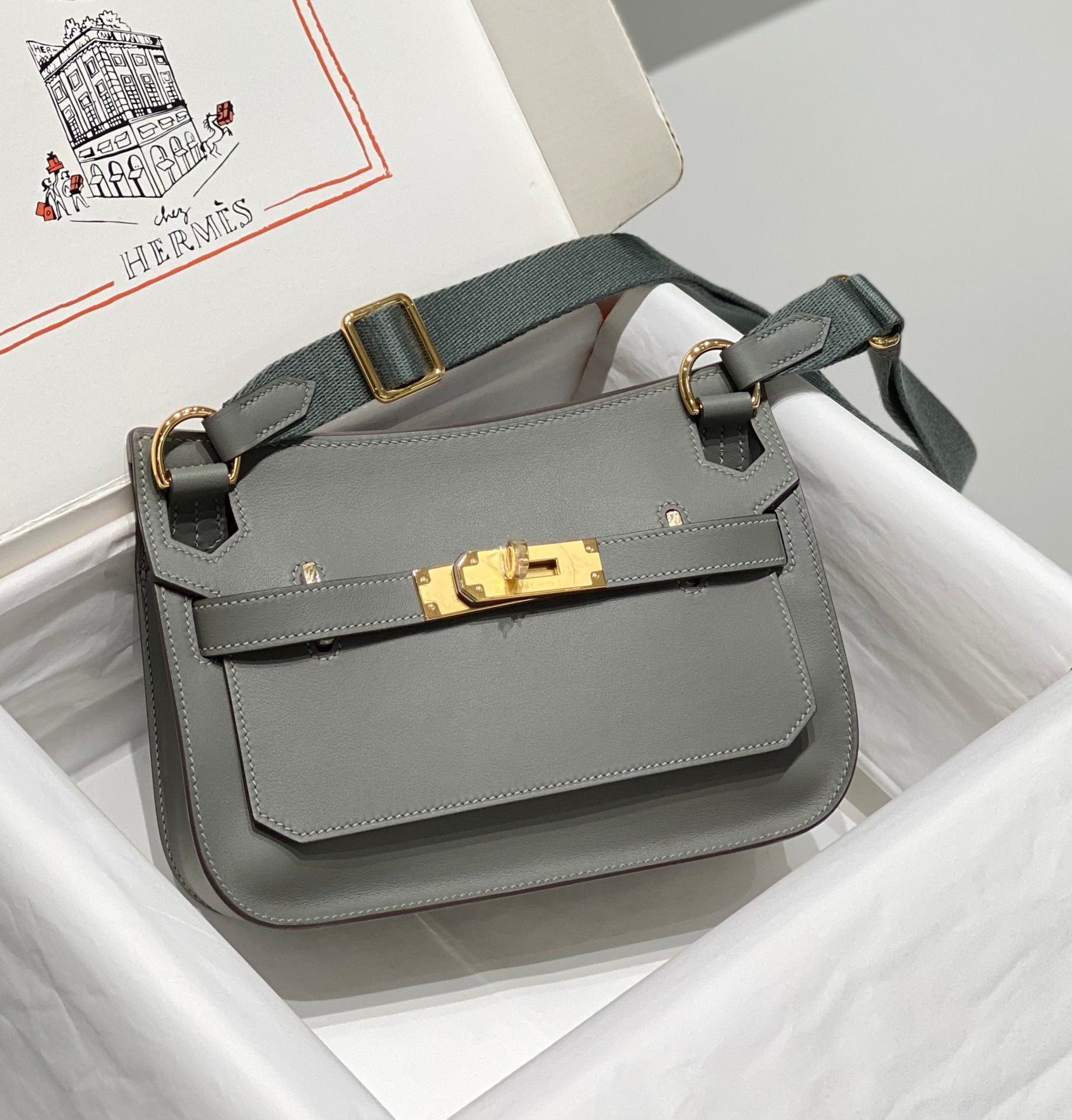 SAC BANDOULIÈRE KELLY 23 CM JYPSIERE EN CUIR GRIS GHW