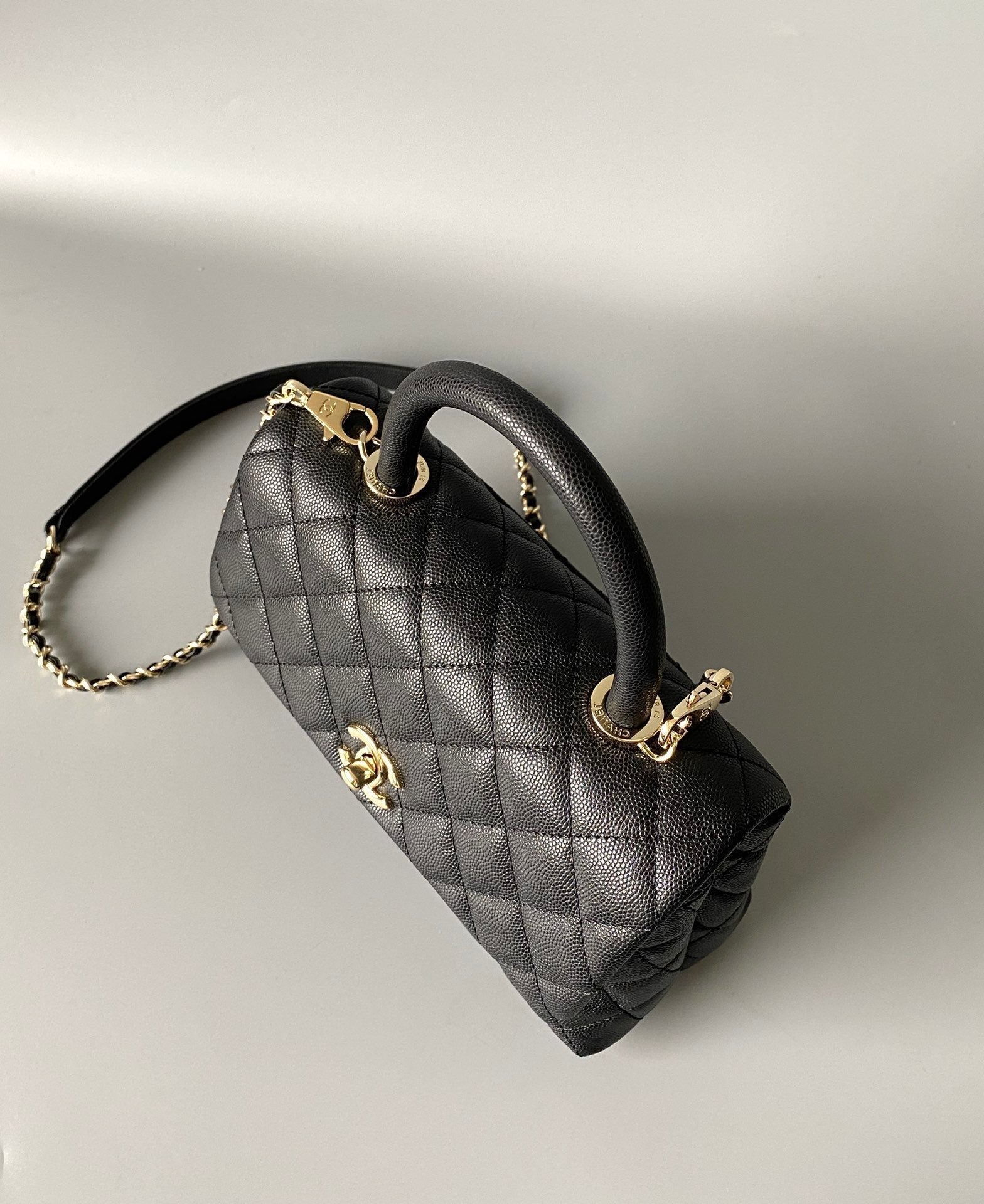 COCO HANDLE FLAP BAG 23CM BLACK QUILTED CAVIAR LIGHT GOLD HARDWARE