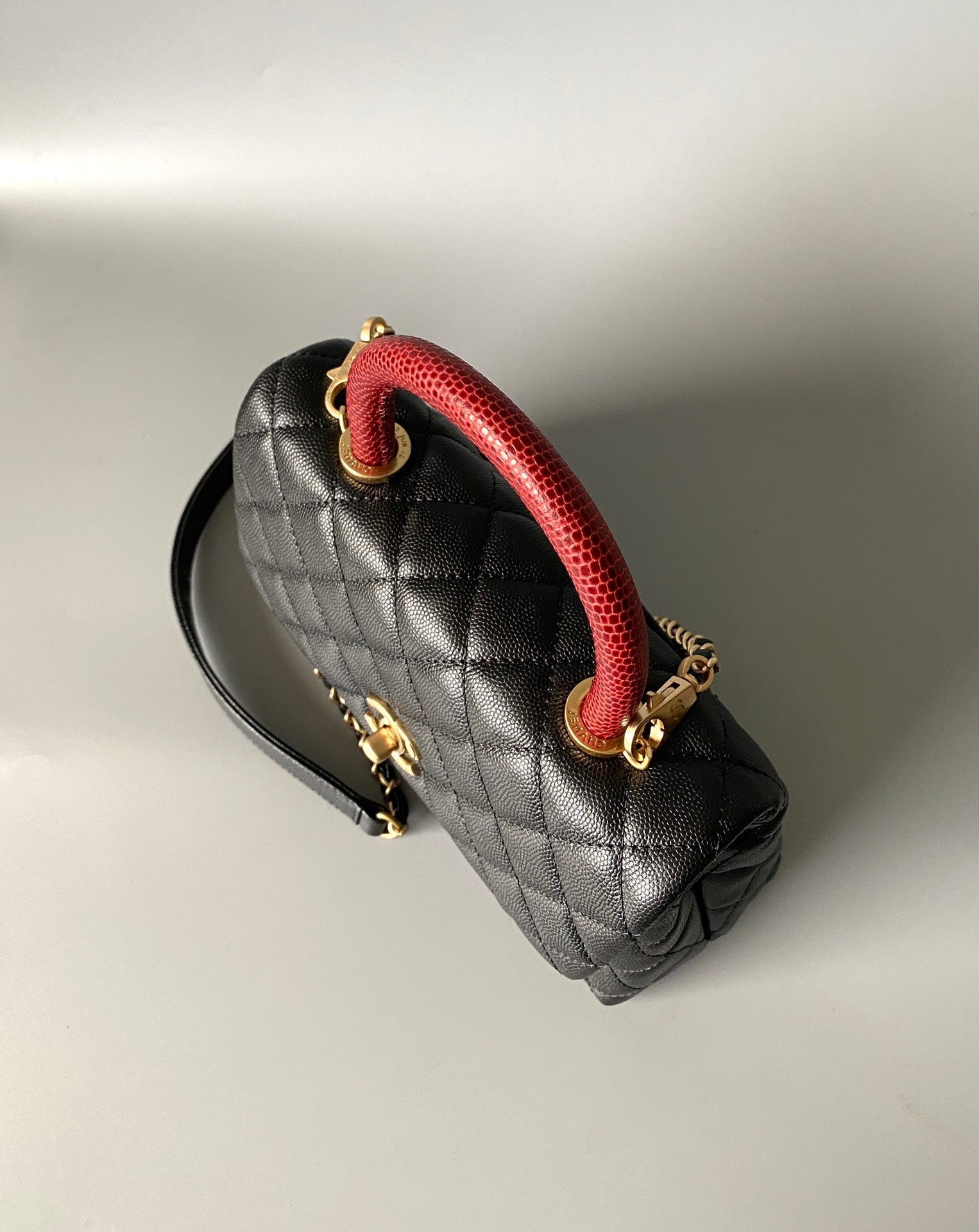 COCO HANDLE FLAP BAG 23CM BLACK QUILTED CAVIAR WITH RED TOP HANDLE