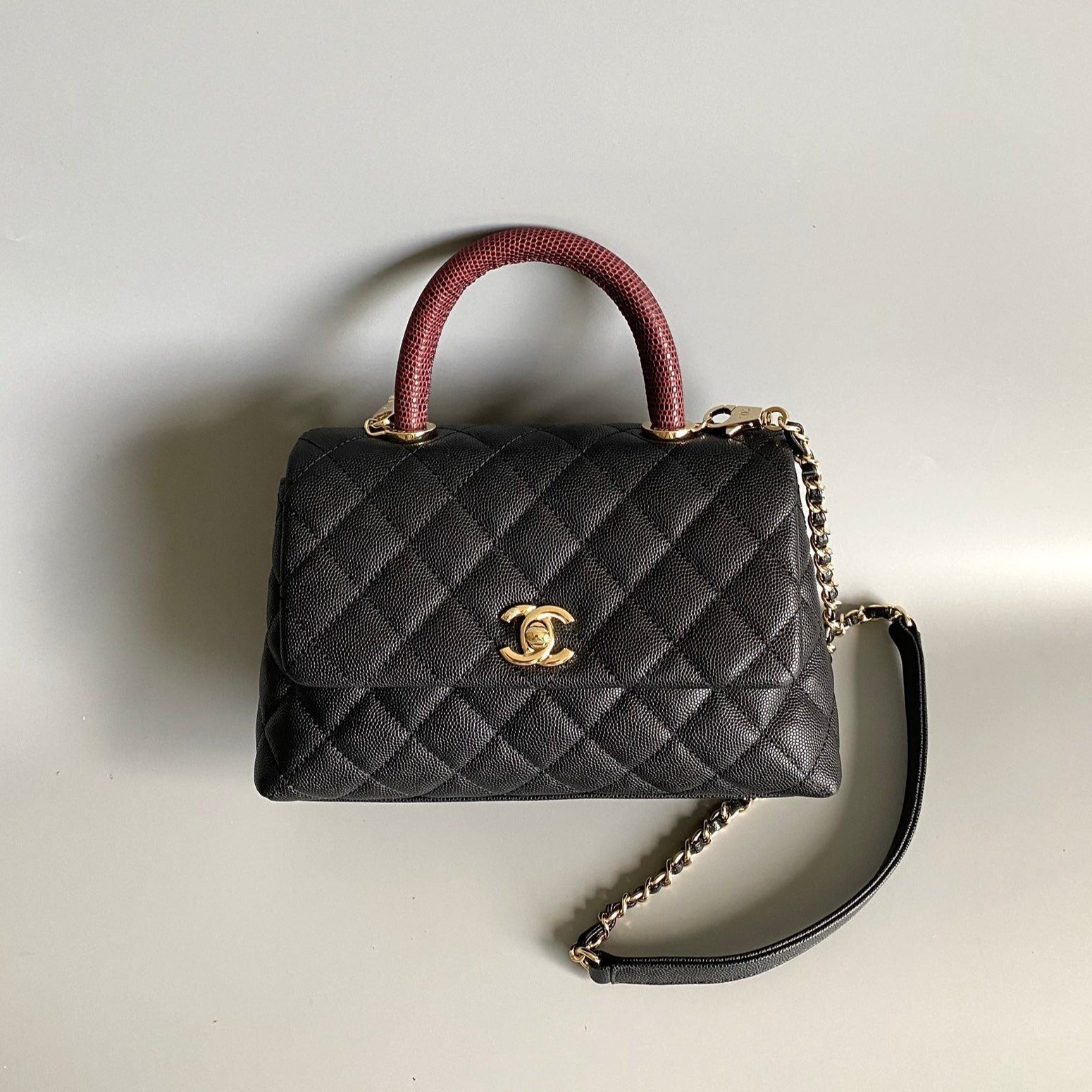 COCO HANDLE FLAP BAG 23CM BLACK QUILTED CAVIAR WITH DARK RED TOP HANDLE