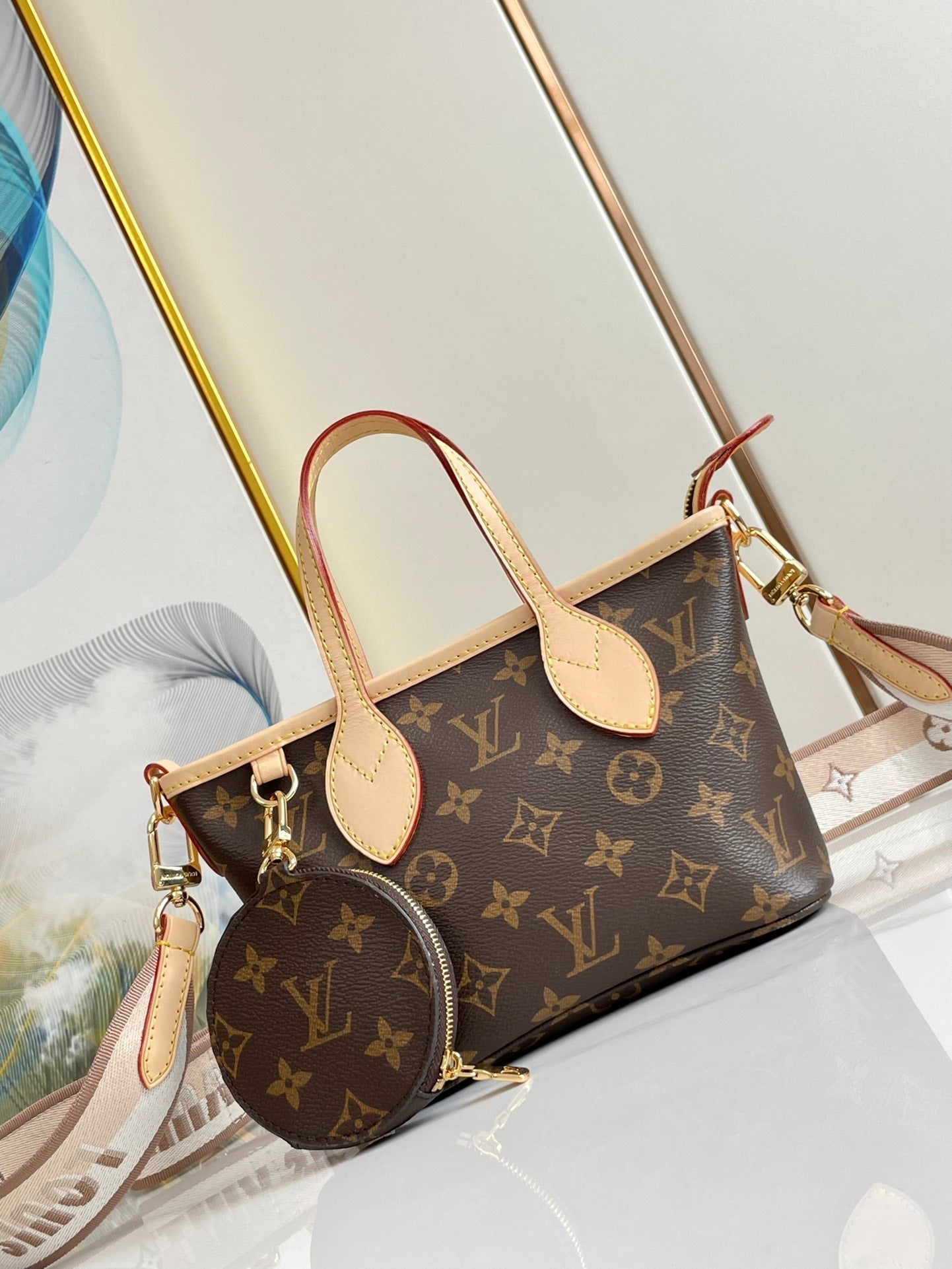 NEVERFULL BB 24 MONOGRAMME MARRON TOILE ET GARNITURE EN CUIR QUINCAILLERIE DORÉ