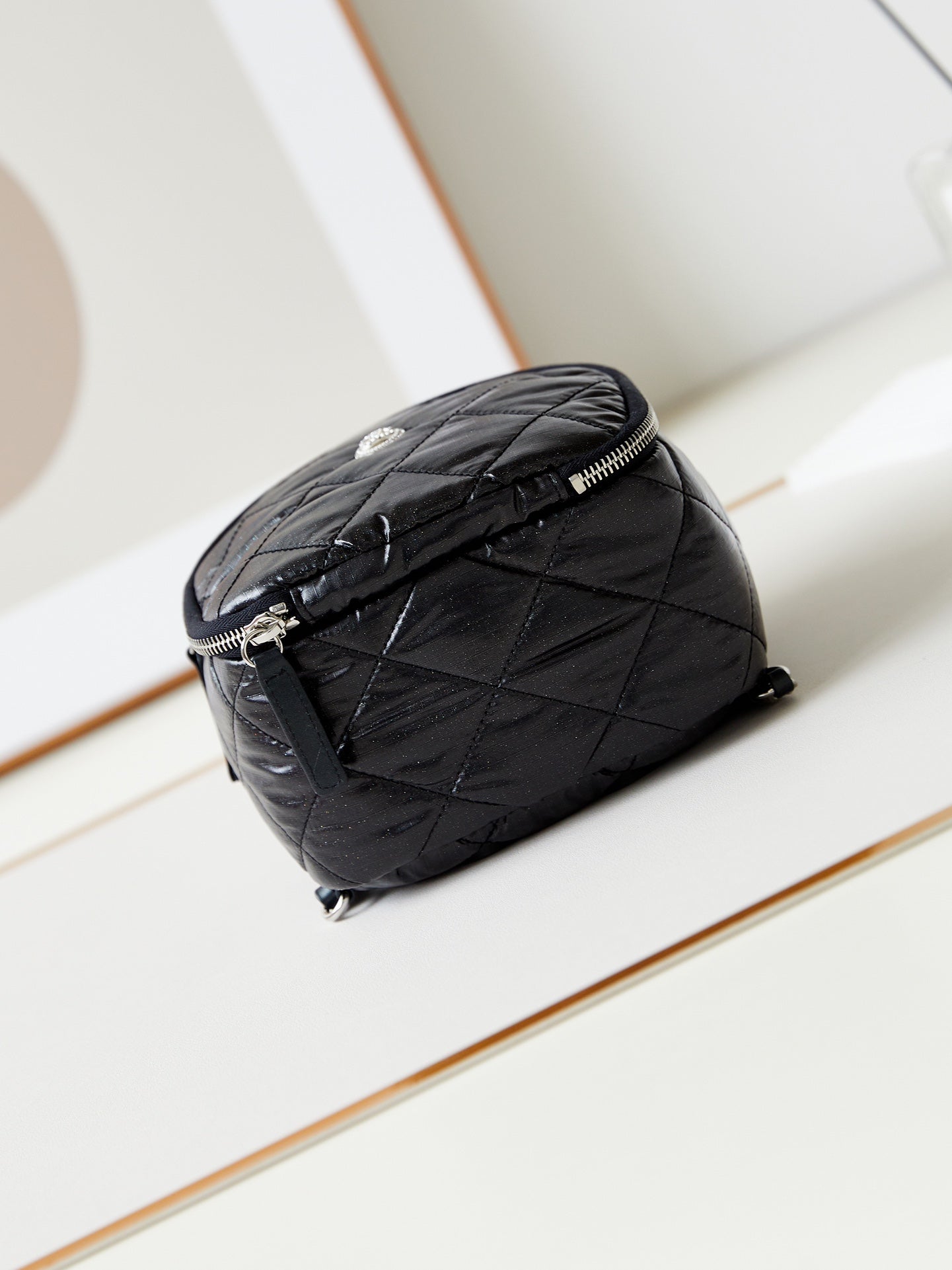 SAC À DOS 22 EN TISSU NOIR QUINCAILLERIE ARGENTÉE 