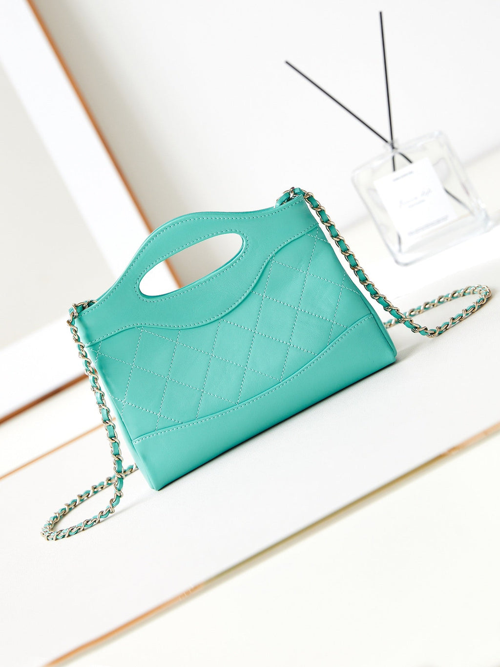 CC 24S31 NANO SHOPPING BAG 17.5CM CLOUD BLUE LAMBSKIN GOLD HARDWARE