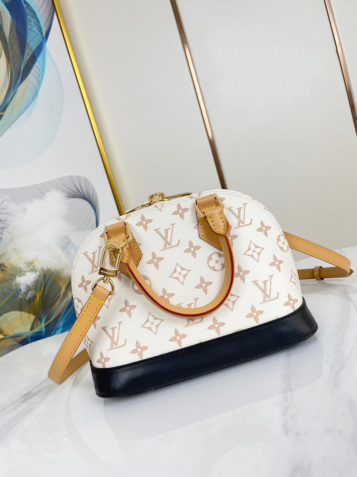 ALMA BB 25 EN TOILE DUNE MONOGRAMME BLANC QUINCAILLERIE DORÉ