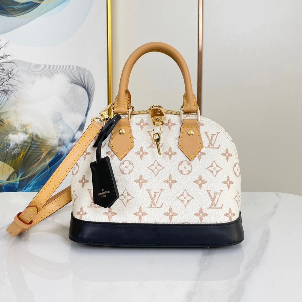 ALMA BB 25 EN TOILE DUNE MONOGRAMME BLANC QUINCAILLERIE DORÉ
