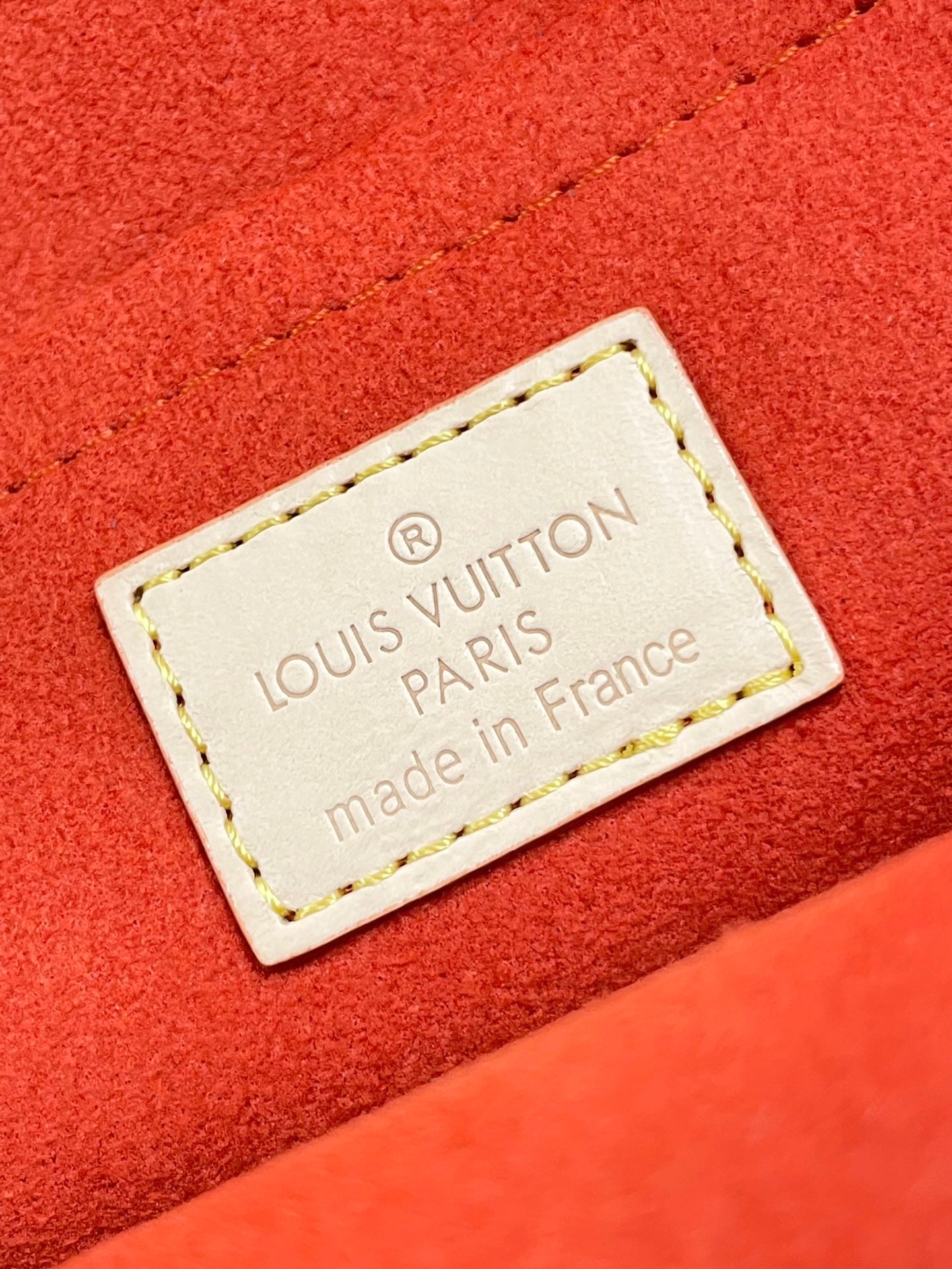 SAC À DOS ALMA 20 EN TOILE MONOGRAMME MARRON ET GARNITURE EN CUIR DE VEAU BEIGE BOUCLE DORÉE