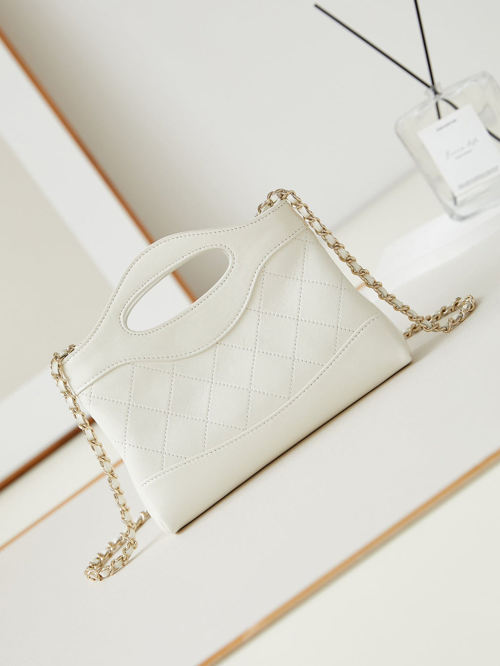 CC 24S31 NANO SHOPPING BAG 17.5CM WHITE LAMBSKIN GOLD HARDWARE