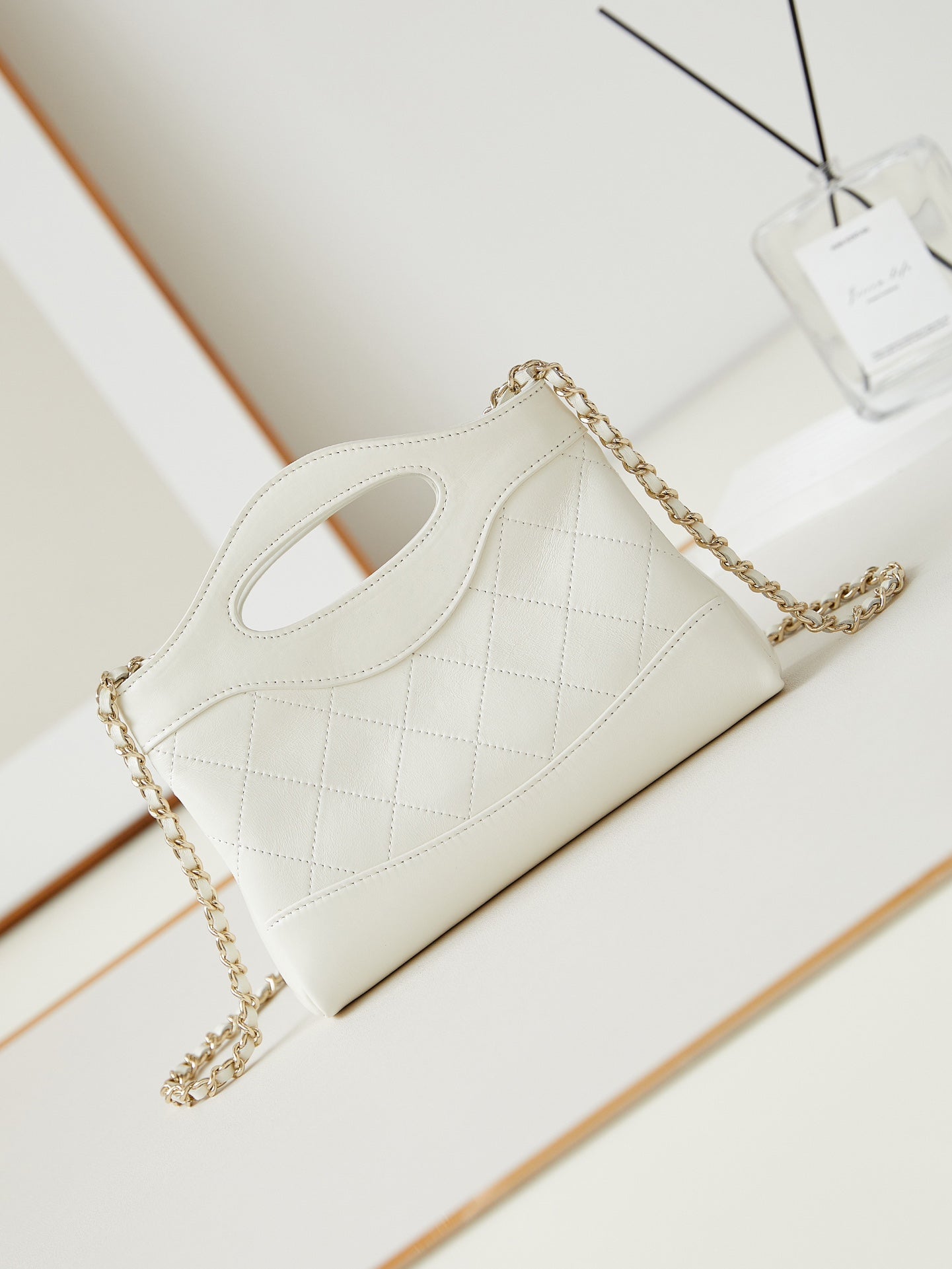 CC 24S31 SAC CABAS NANO 17,5 CM CUIR D'AGNEAU BLANC QUINCAILLERIE DORÉ