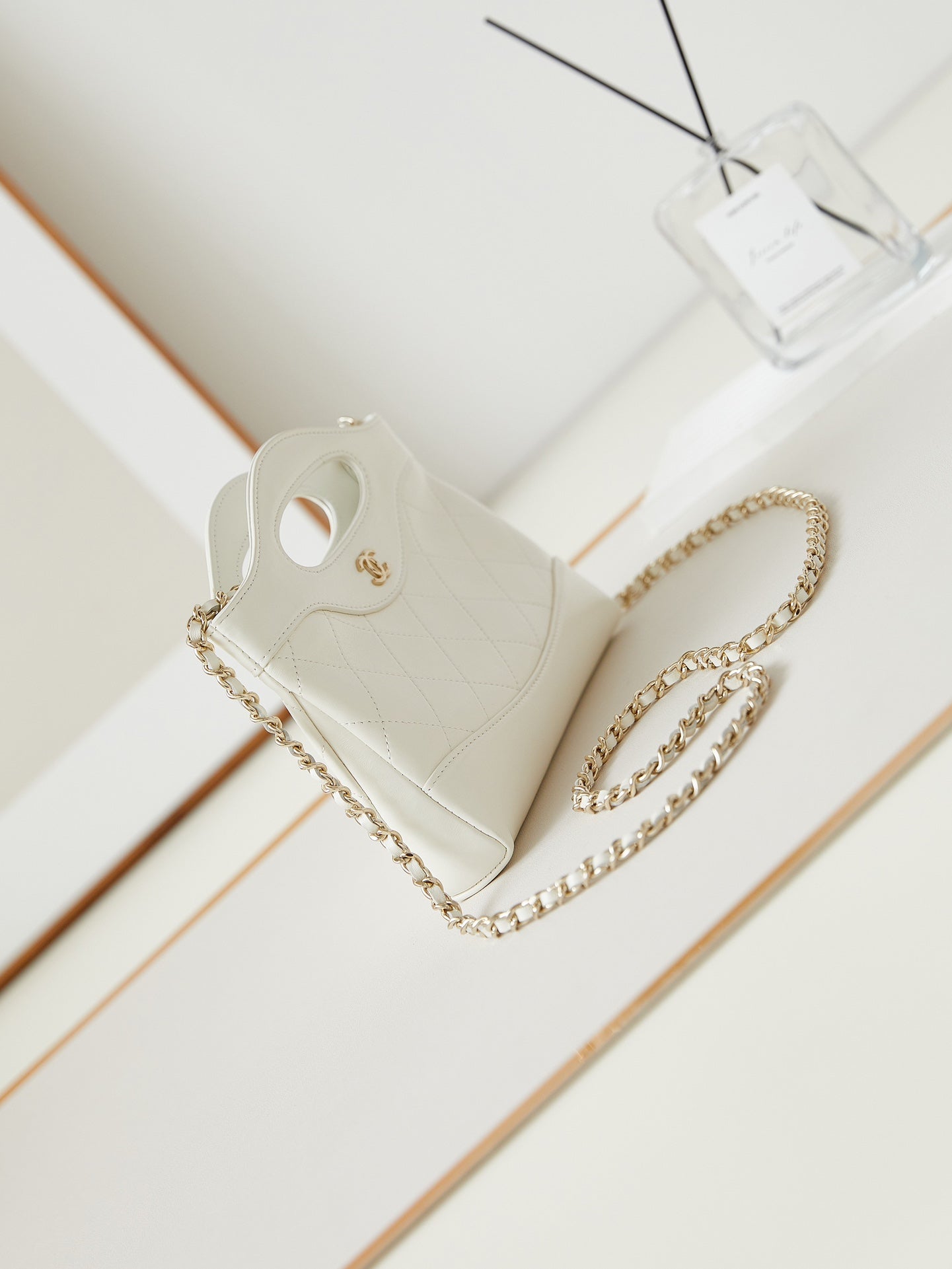CC 24S31 NANO SHOPPING BAG 17.5CM WHITE LAMBSKIN GOLD HARDWARE