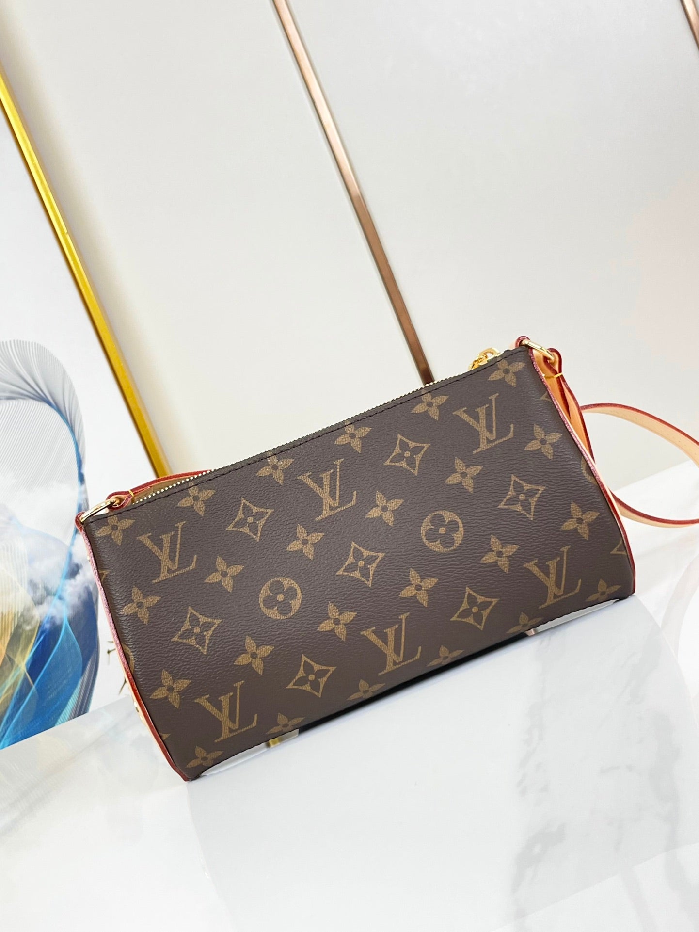 POCHETTE TIRETTE 22 EN TOILE MONOGRAMME MARRON BOUCLE DOREE