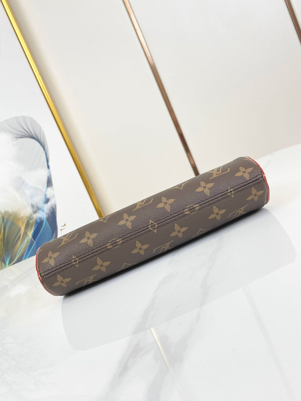 POCHETTE TIRETTE 22 EN TOILE MONOGRAMME MARRON BOUCLE DOREE
