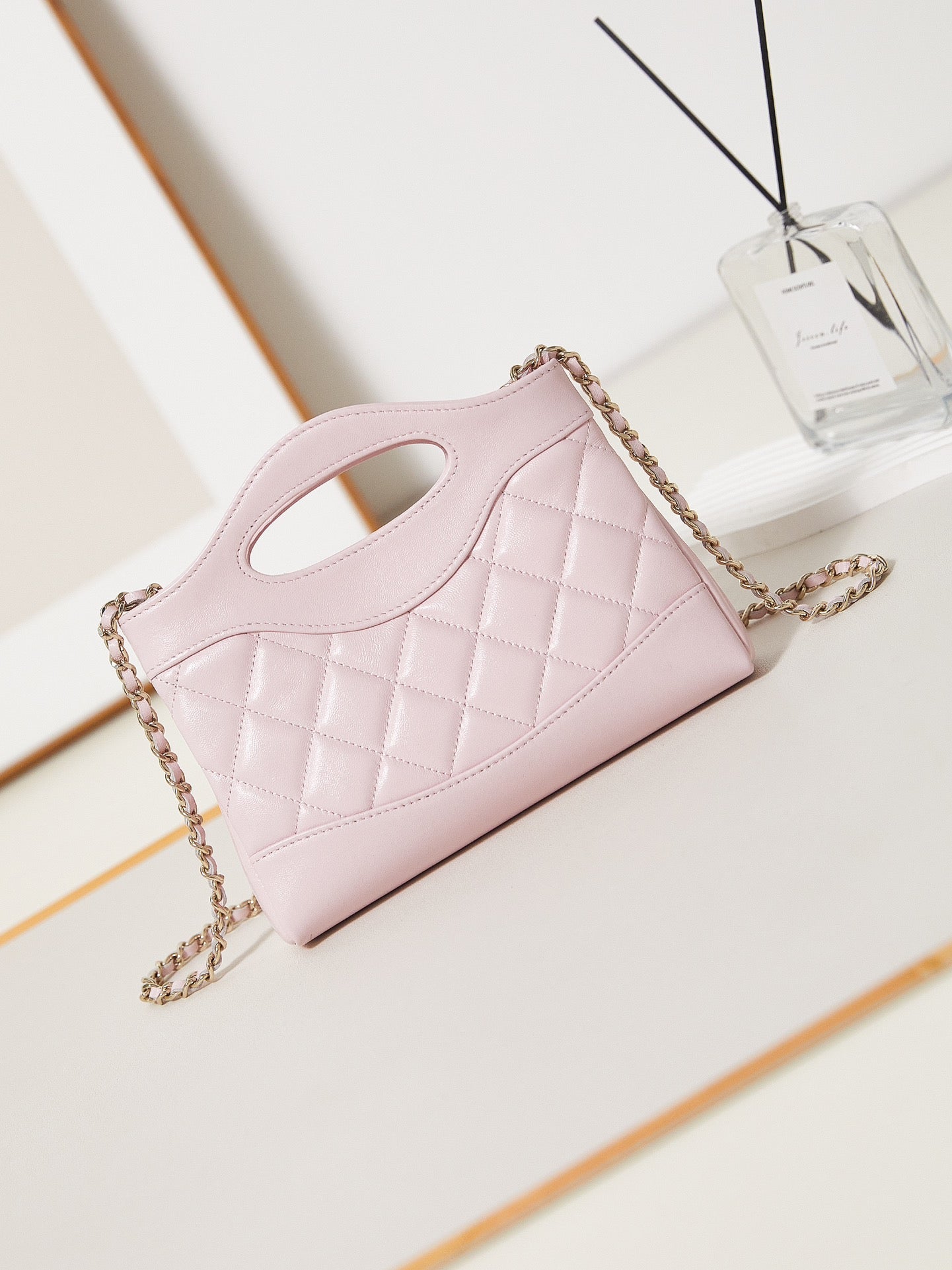 CC 24S31 SAC CABAS NANO 17,5 CM CUIR D'AGNEAU ROSE CLAIR QUINCAILLERIE DORÉ