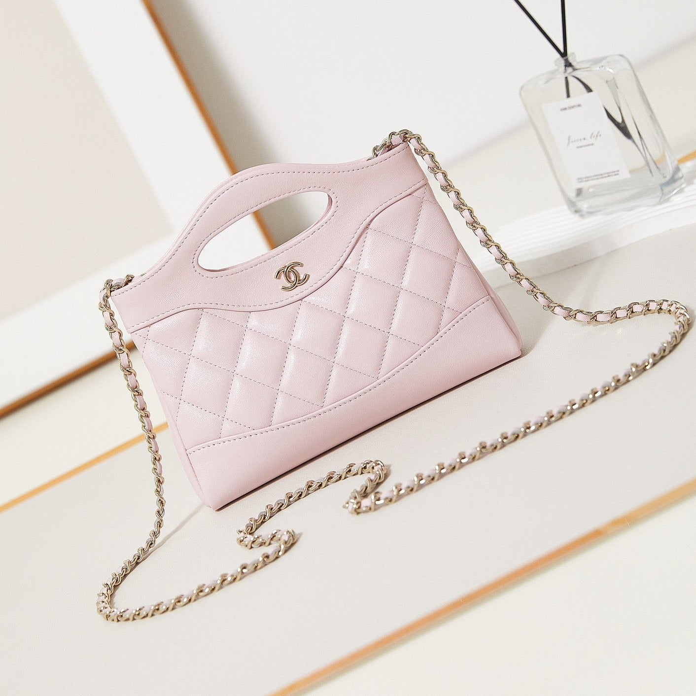 CC 24S31 SAC CABAS NANO 17,5 CM CUIR D'AGNEAU ROSE CLAIR QUINCAILLERIE DORÉ