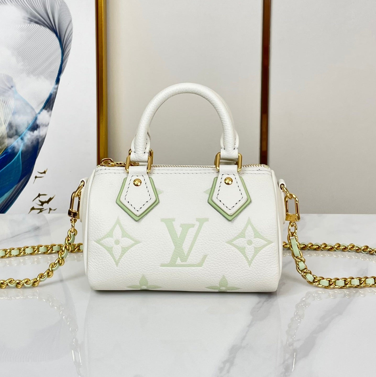 NANO SPEEDY 16 EN BLANC LATTE MONOGRAMME EMPREINTE CUIR QUINCAILLERIE DORÉ