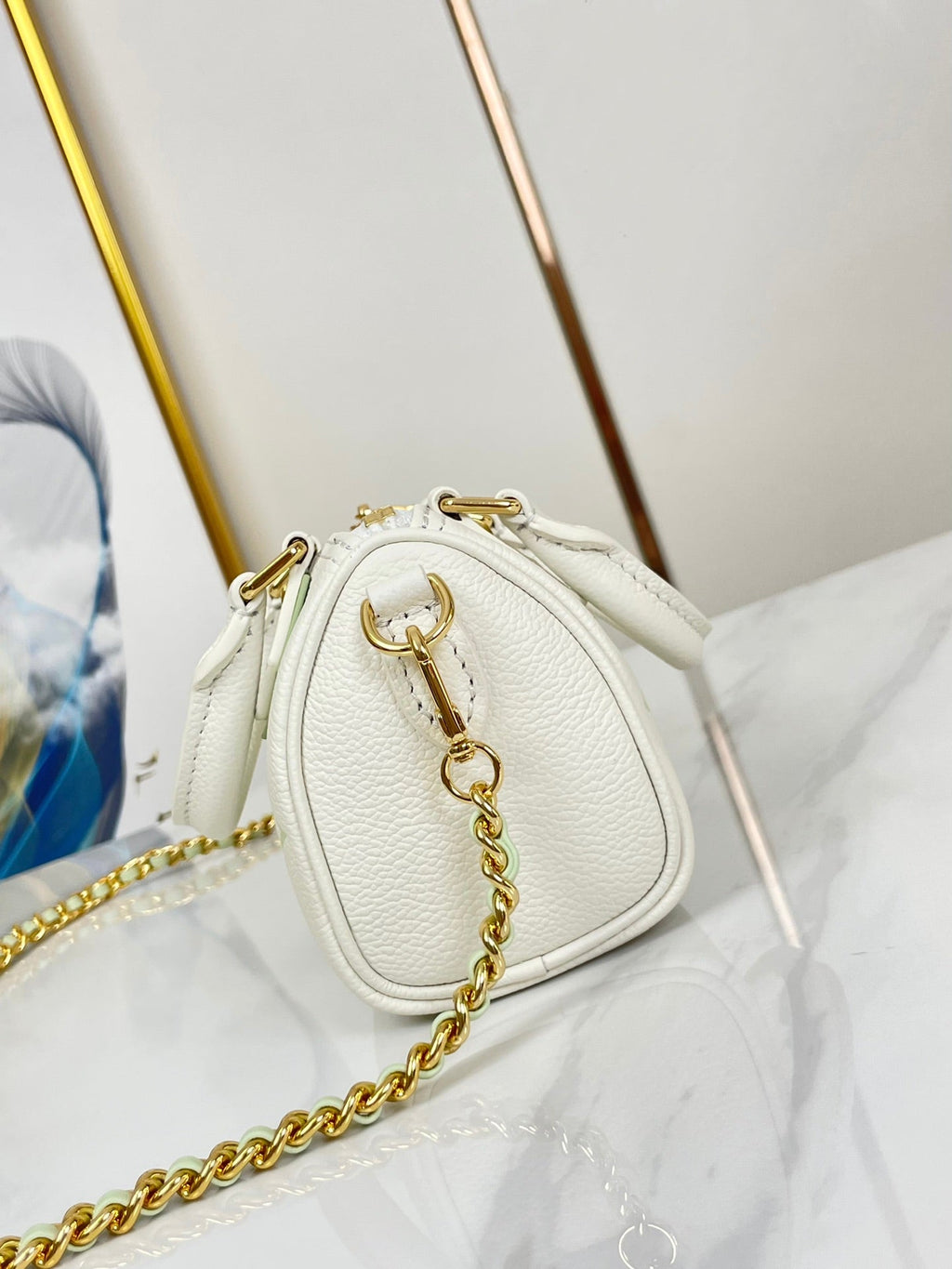 NANO SPEEDY 16 EN BLANC LATTE MONOGRAMME EMPREINTE CUIR QUINCAILLERIE DORÉ