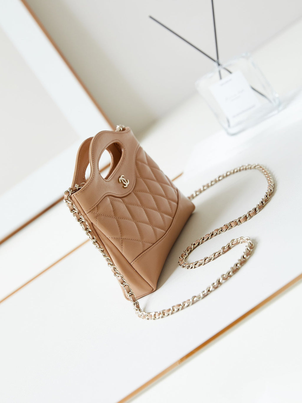 CC 24S31 NANO SHOPPING BAG 17.5CM BROWN LAMBSKIN GOLD HARDWARE