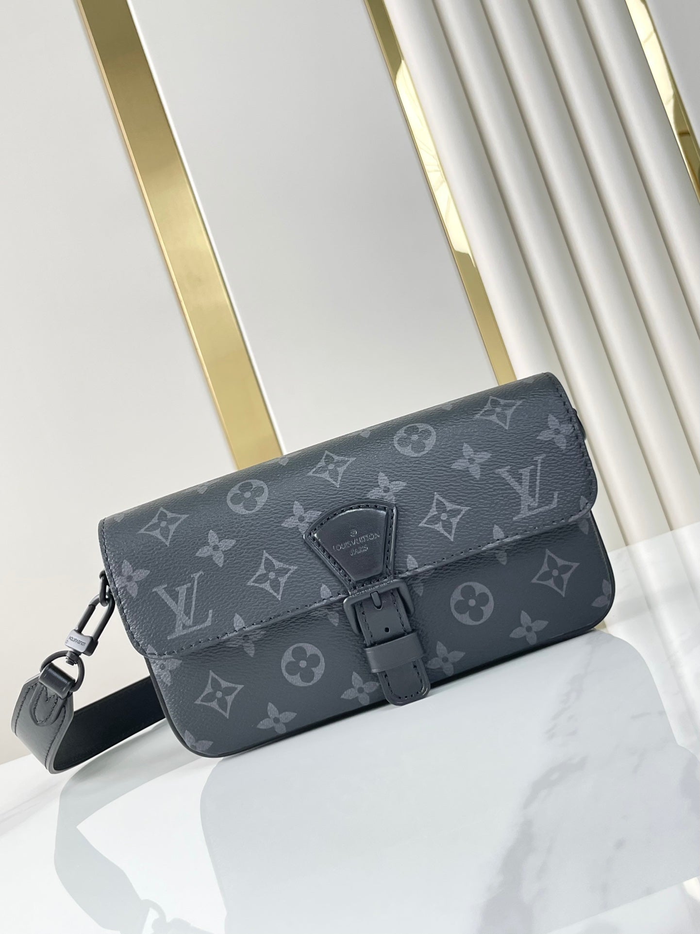 PORTEFEUILLE PORTABLE MONTSOURIS 22 EN TOILE ÉCLIPSE MONOGRAMME GUN METAL
