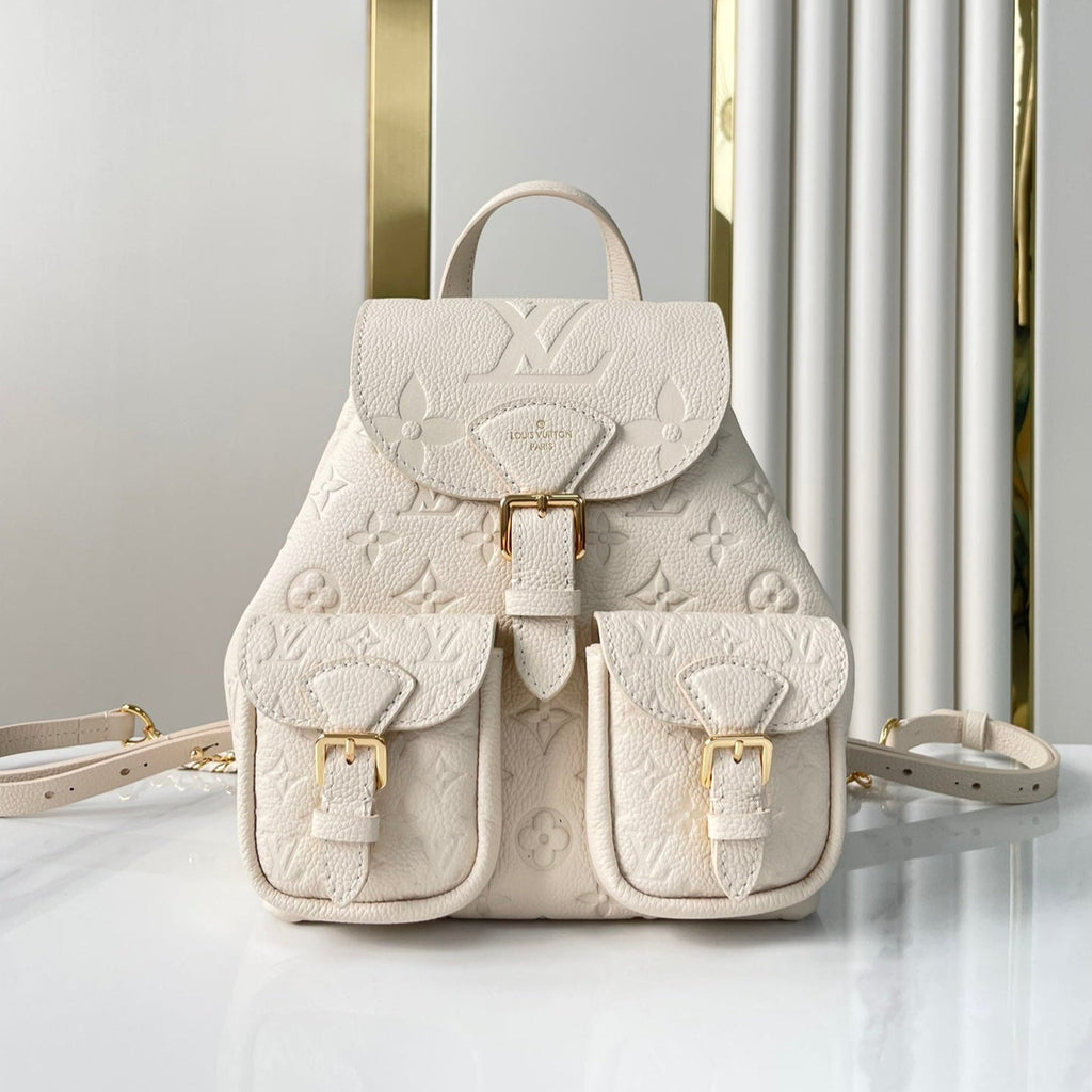 SAC À DOS DE SECOURS 22 EN CUIR EMPREINTE MONOGRAMME CRÈME