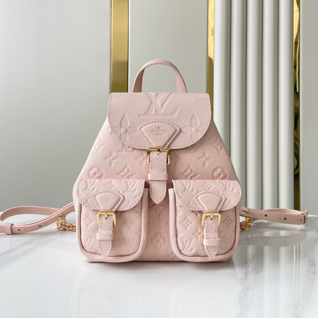 SAC À DOS DE SECOURS 22 EN CUIR EMPREINTE MONOGRAMME ROSE CLAIR