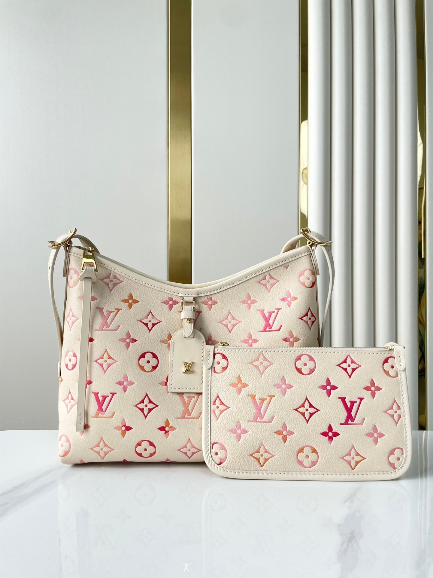 CARRYALL PM 29 EN CUIR MONOGRAMME EMPREINTE SUNRISE AQUARELLE