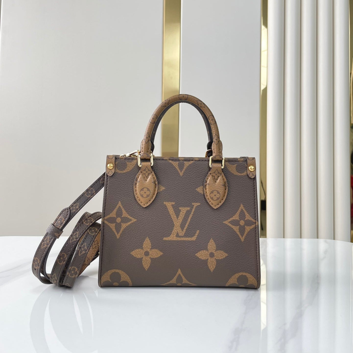 ONTHEGO BB 18 EN TOILE MONOGRAMME MARRON ET MONOGRAMME INVERSE