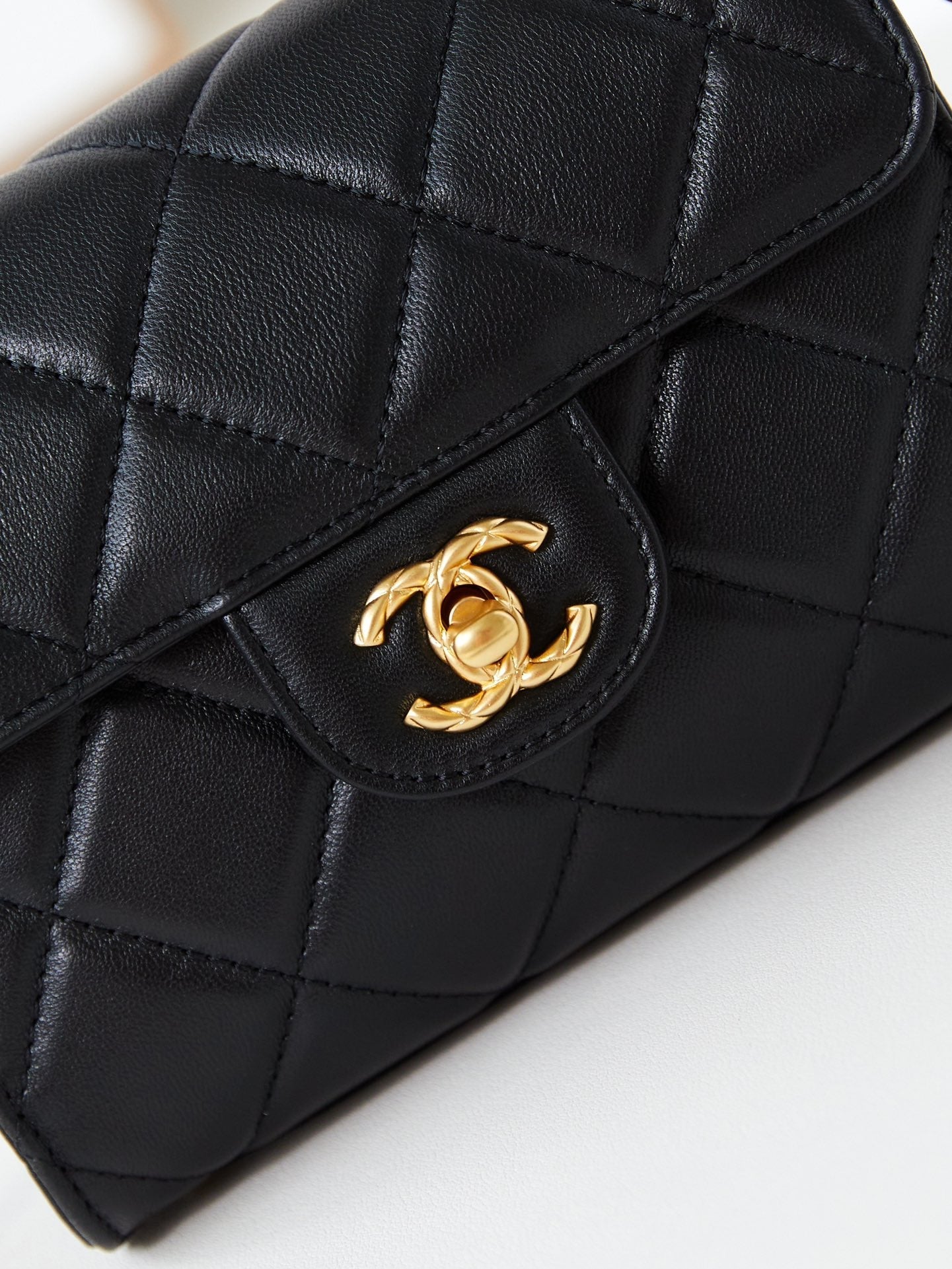 24A FLAP BAG WITH TOP HANDLE 18CM BLACK LAMBSKIN GOLD HARDWARE