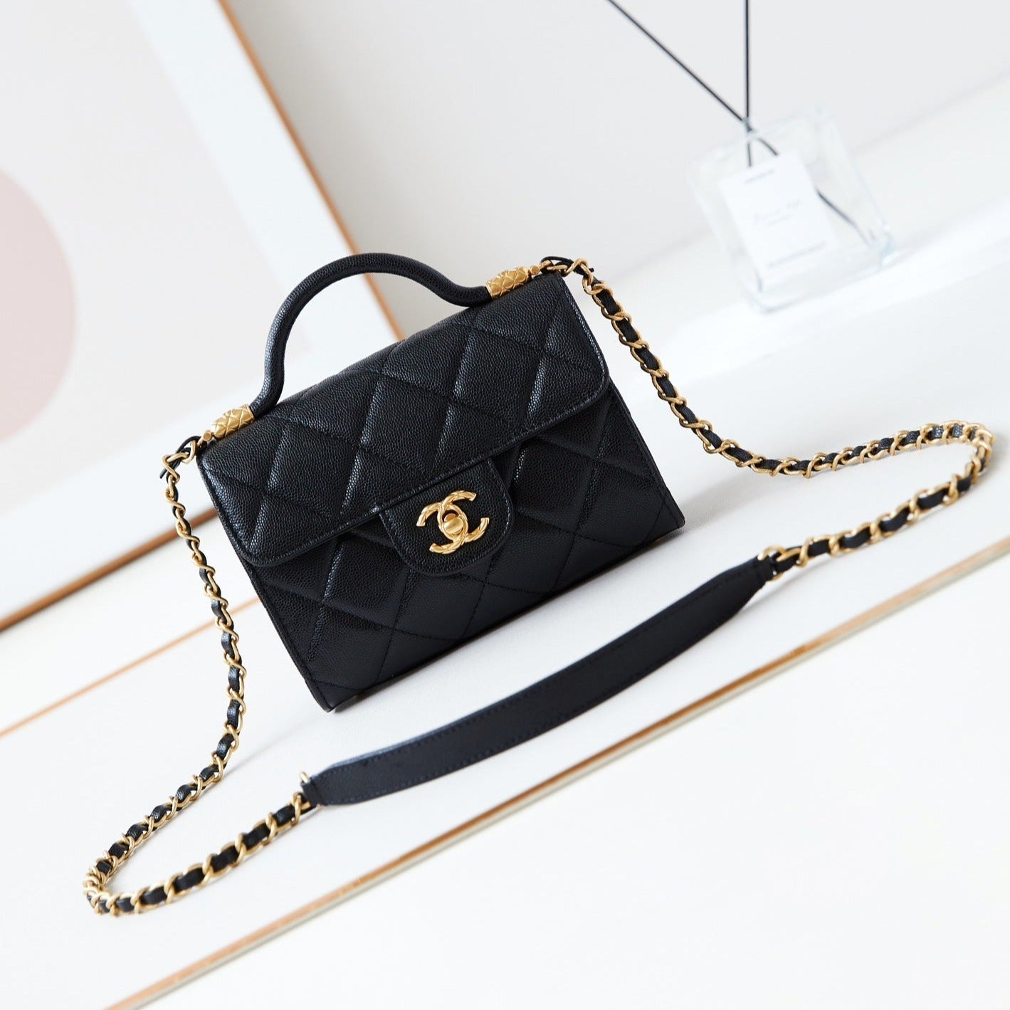 24A FLAP BAG WITH TOP HANDLE 18CM BLACK CAVIAR GOLD HARDWARE