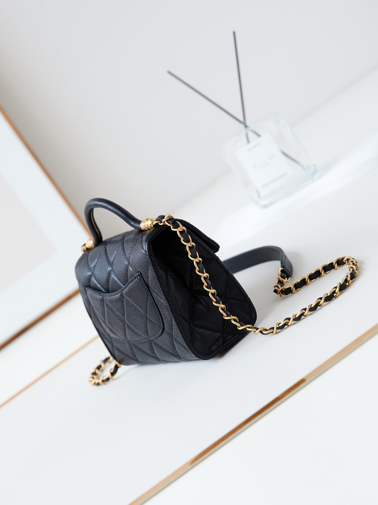 24A FLAP BAG WITH TOP HANDLE 18CM BLACK CAVIAR GOLD HARDWARE