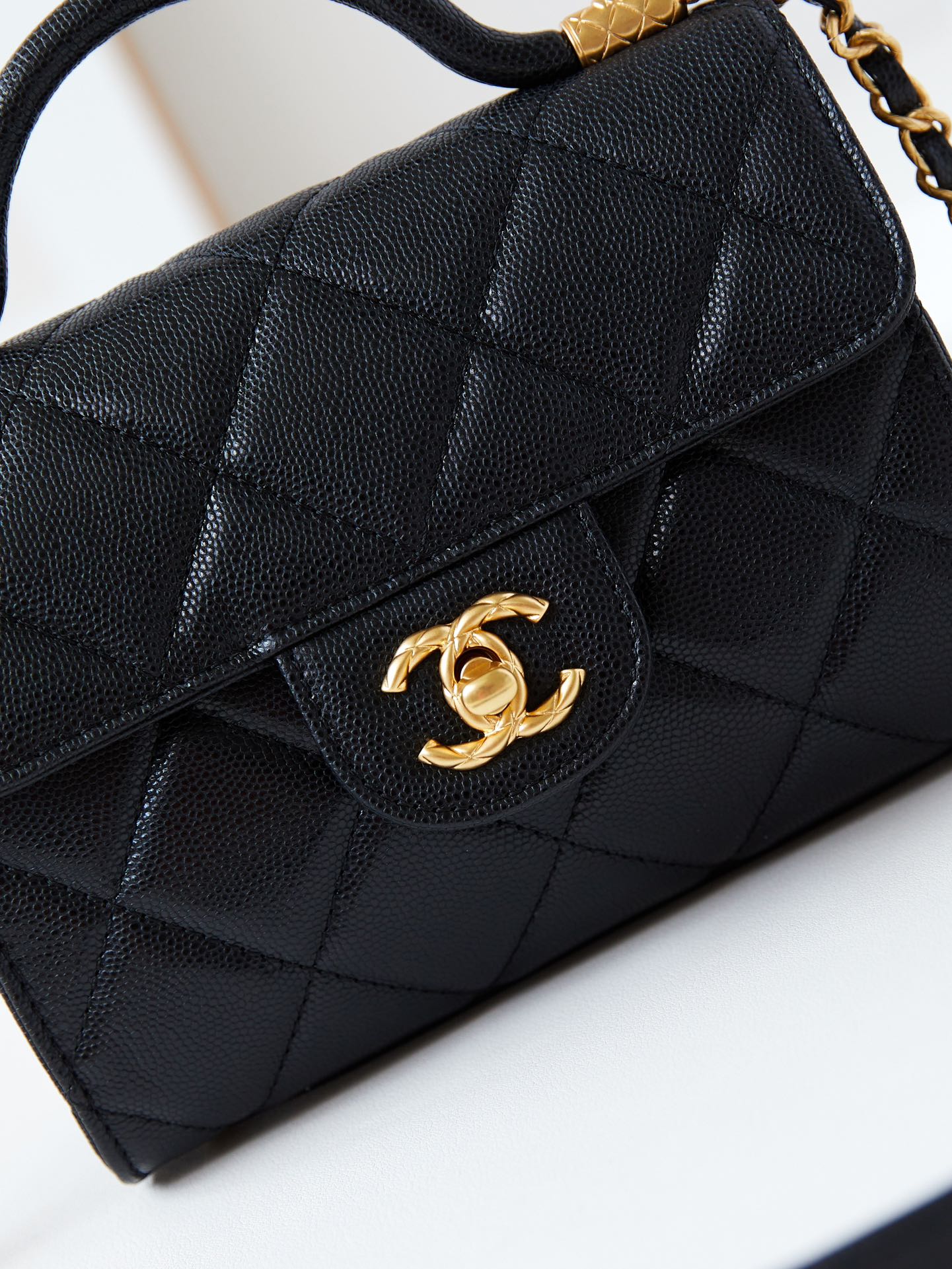 24A FLAP BAG WITH TOP HANDLE 18CM BLACK CAVIAR GOLD HARDWARE