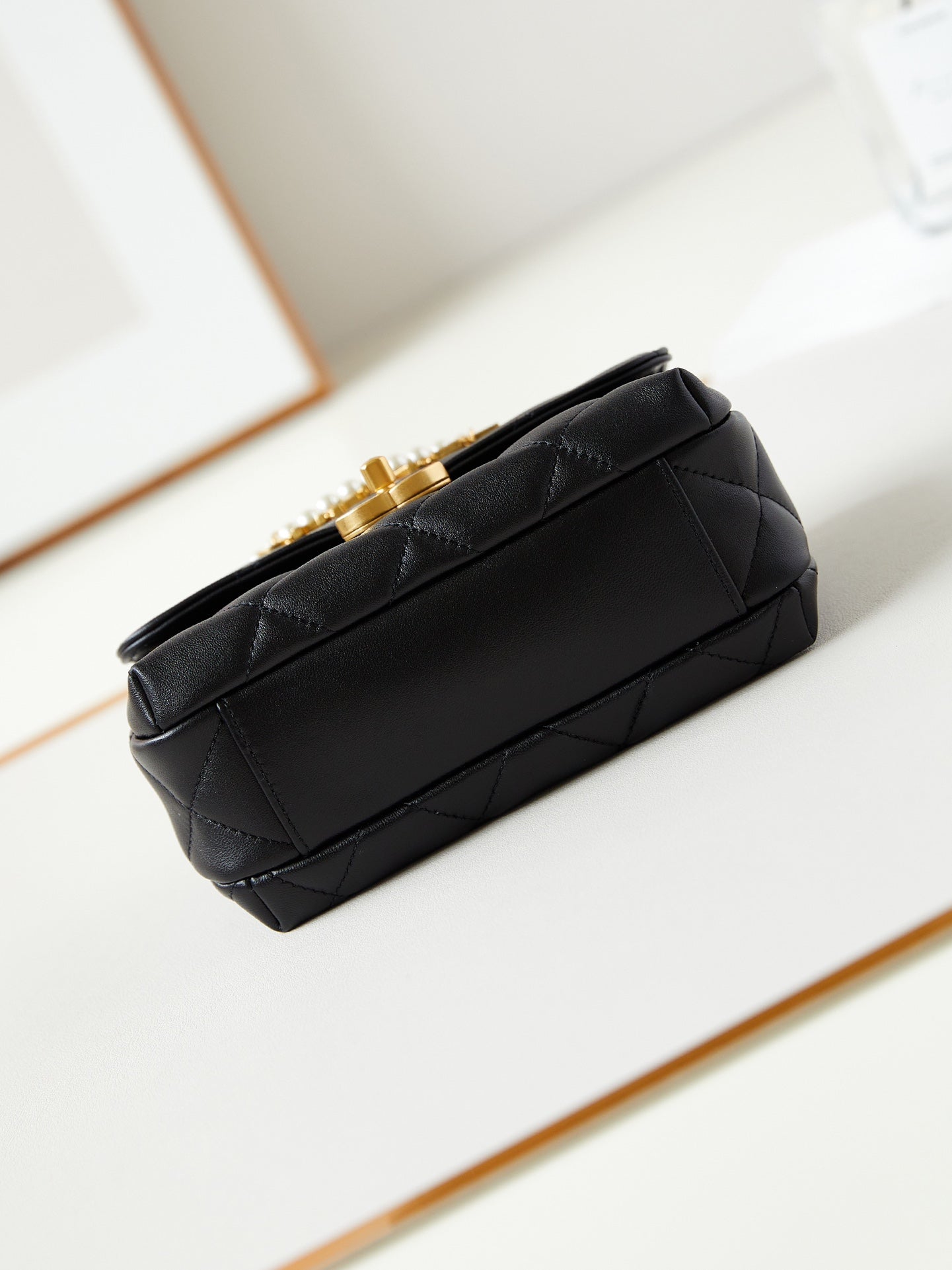 24A MINI FLAP BAG 20CM BLACK LAMBSKIN PEARL AND GOLD HARDWARE