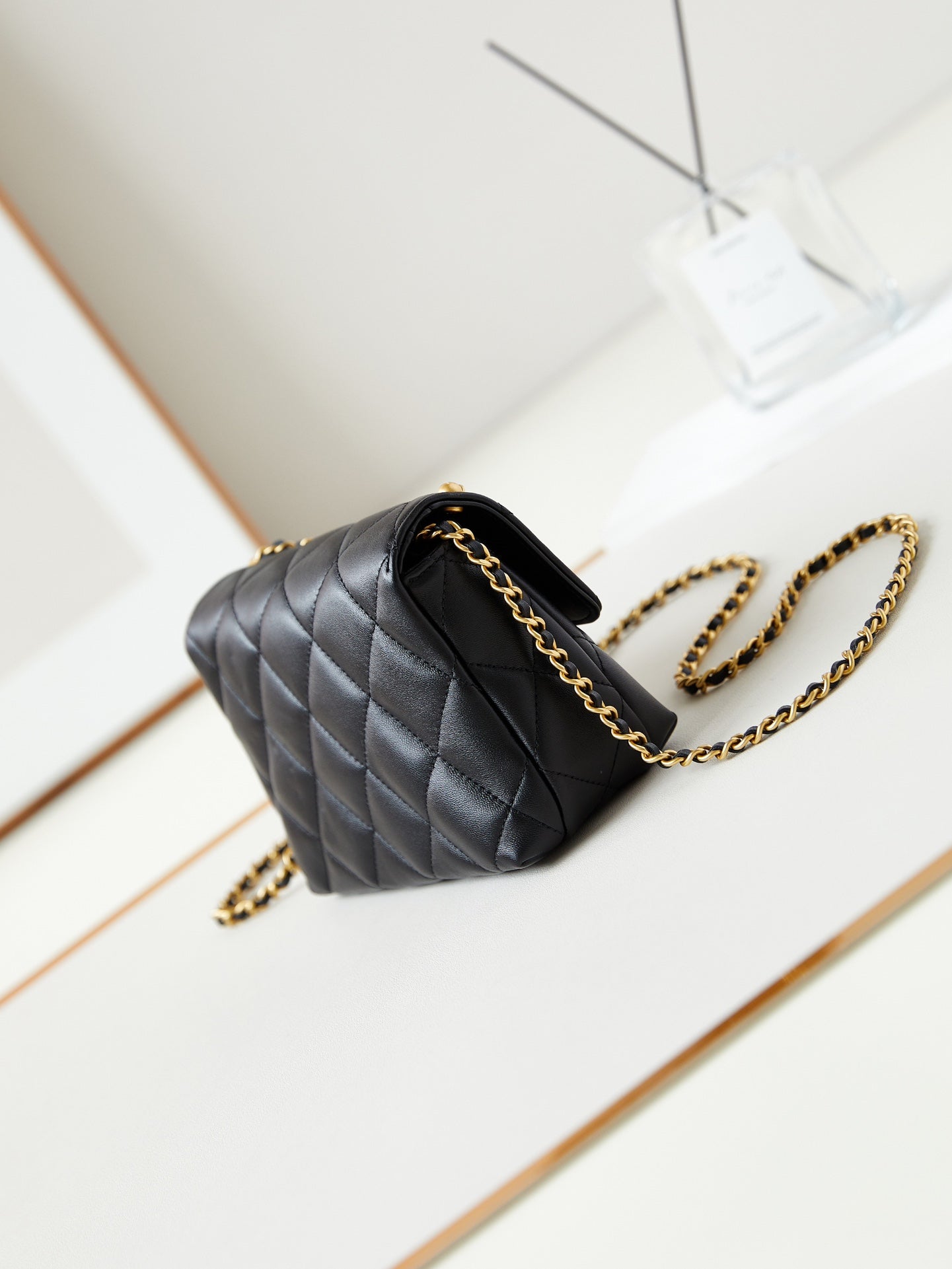 24A MINI FLAP BAG 20CM BLACK LAMBSKIN PEARL AND GOLD HARDWARE