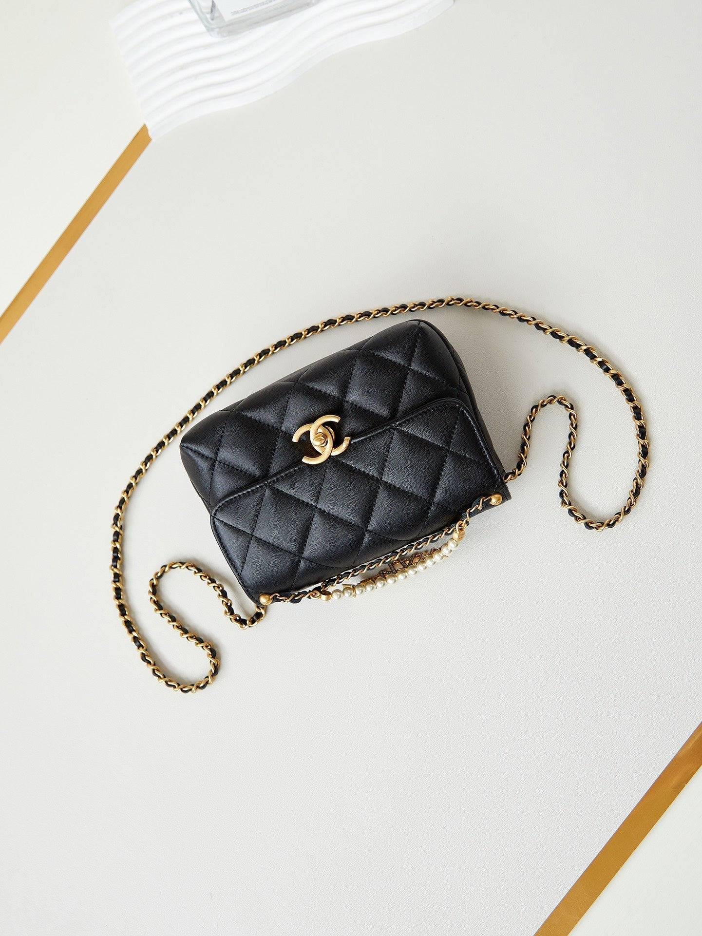 24A MINI FLAP BAG 20CM BLACK LAMBSKIN PEARL AND GOLD HARDWARE
