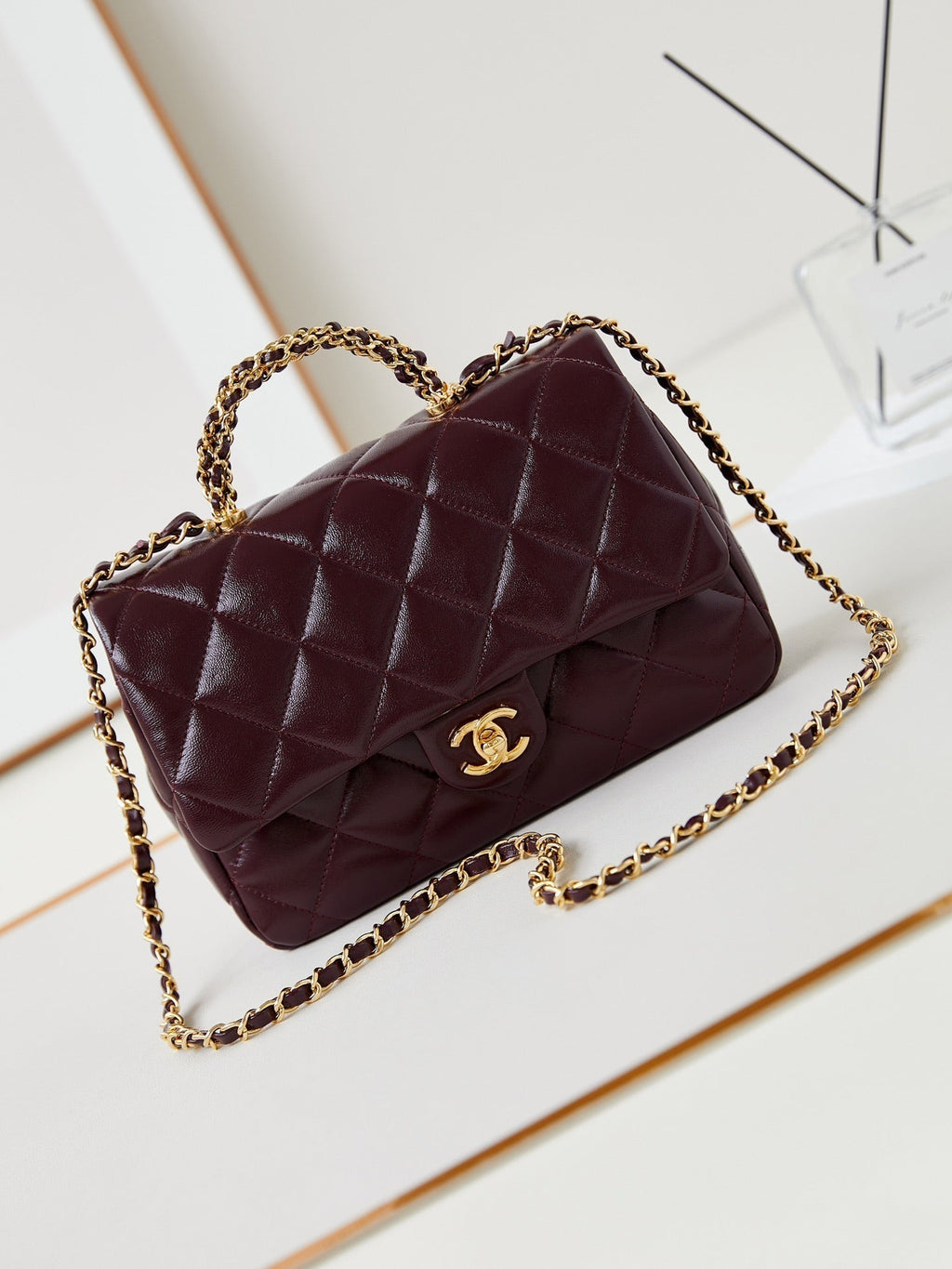 CC FLAP BAG WITH TOP HANDLE 25CM WINE RED SHEEPSKIN GOLD HARDWARE 238481