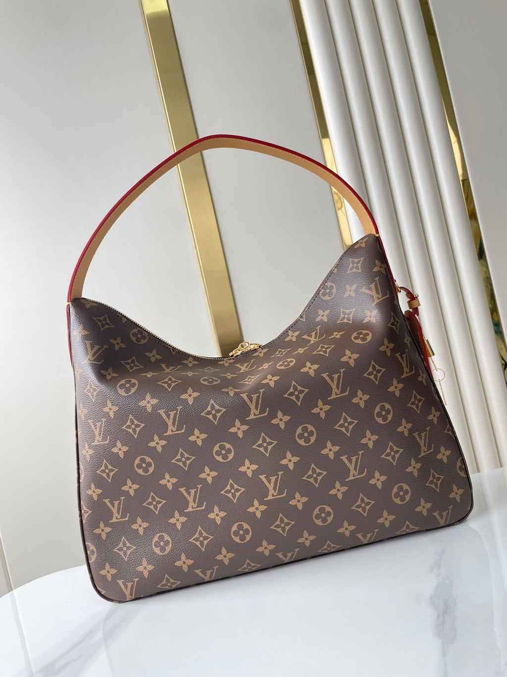 SLOUCHY MM 40 EN TOILE MONOGRAMME MARRON