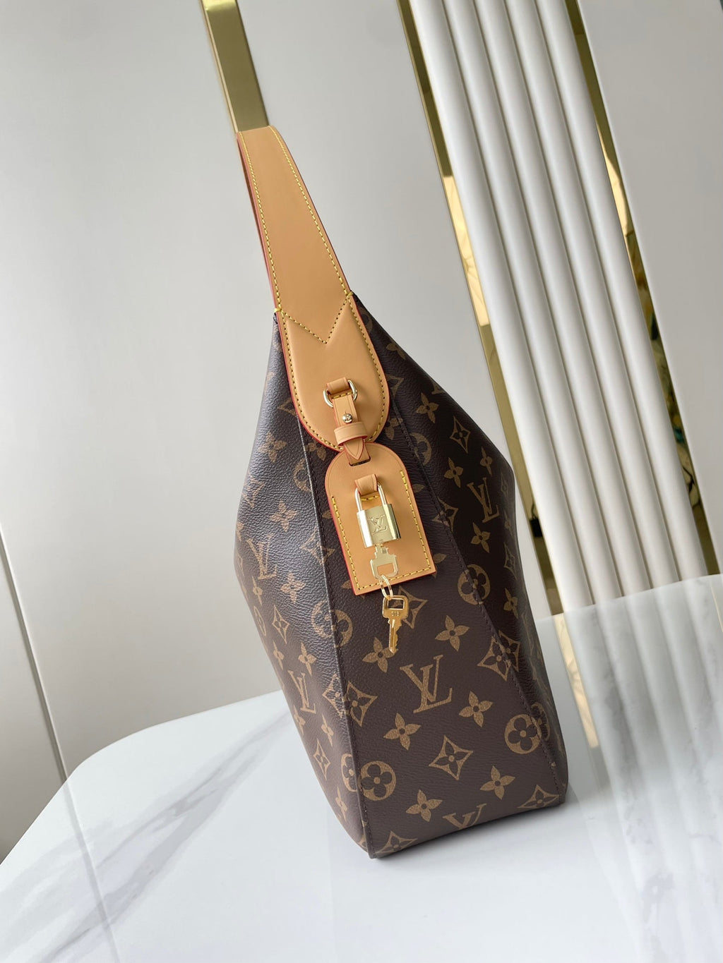 SLOUCHY MM 40 EN TOILE MONOGRAMME MARRON
