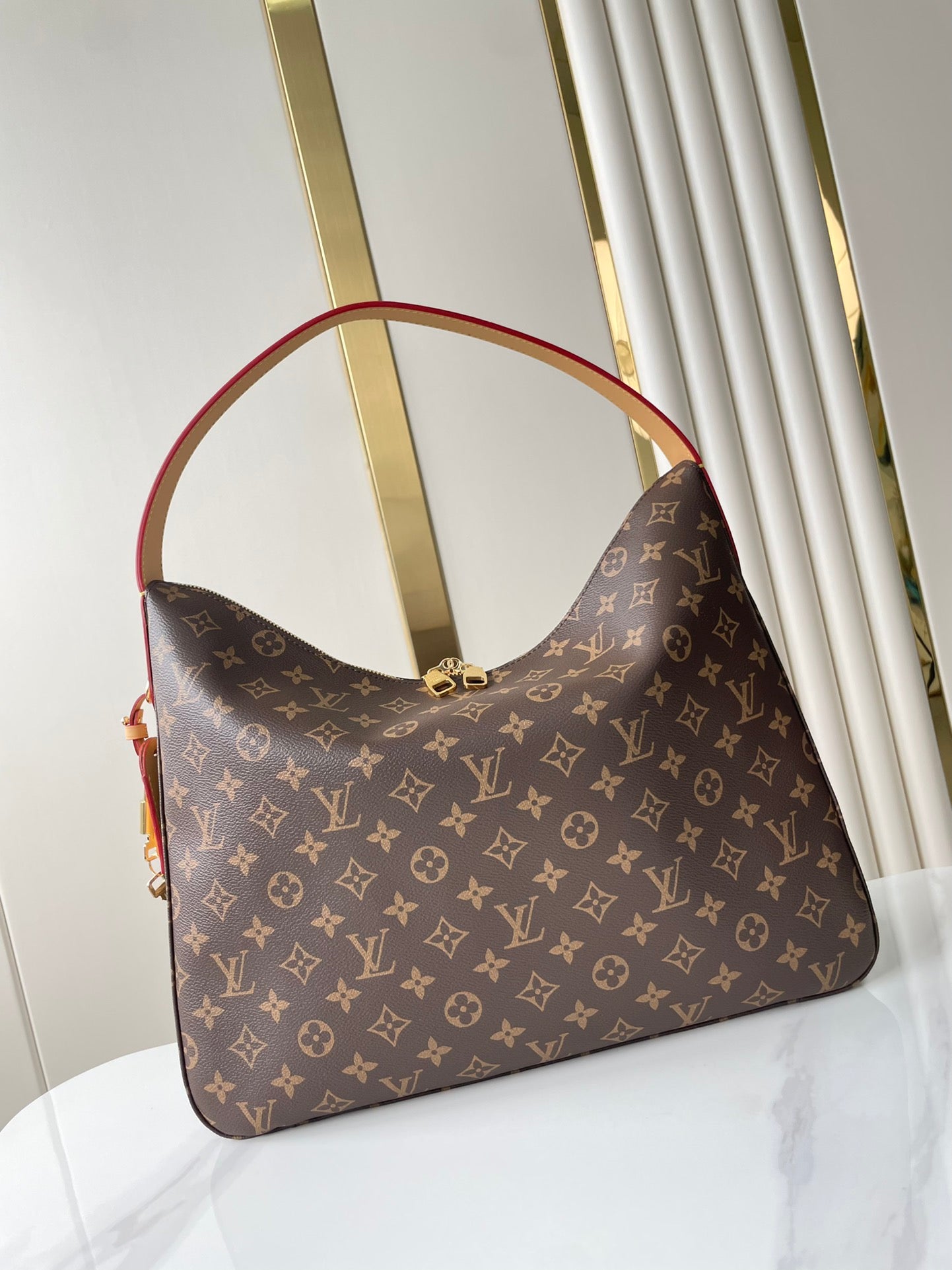 SLOUCHY MM 40 EN TOILE MONOGRAMME MARRON