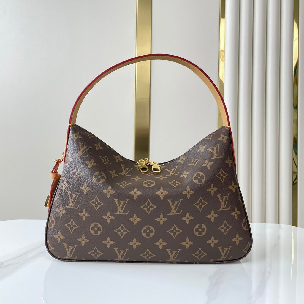 SLOUCHY PM 33 EN TOILE MONOGRAMME MARRON