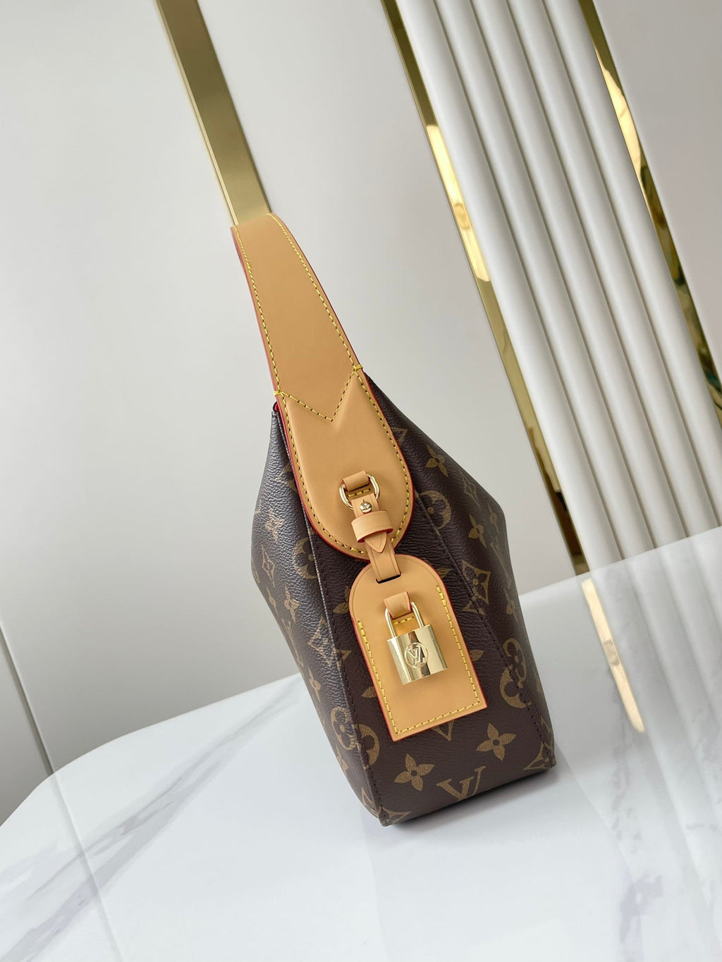 SLOUCHY PM 33 EN TOILE MONOGRAMME MARRON
