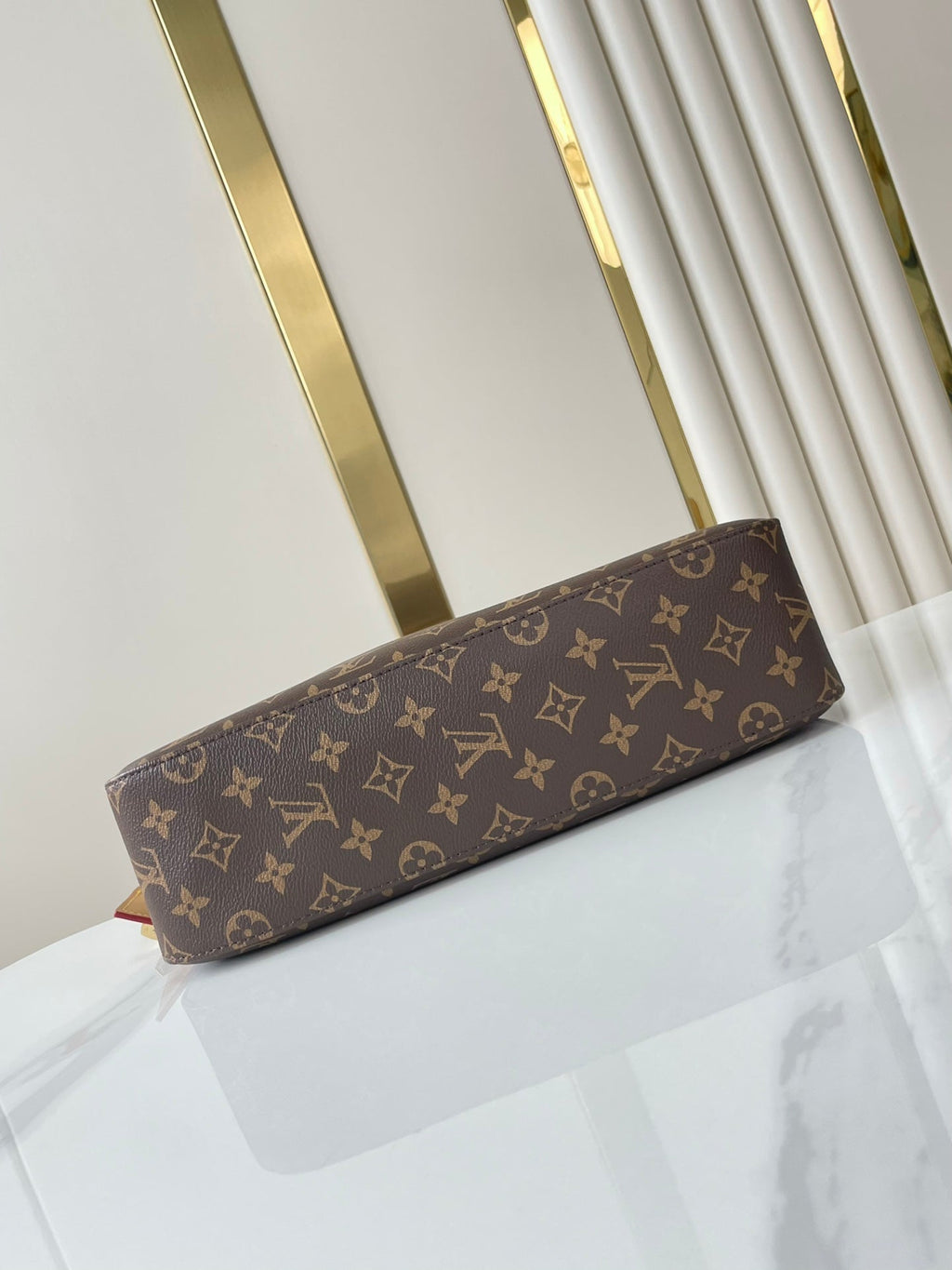 SLOUCHY PM 33 EN TOILE MONOGRAMME MARRON
